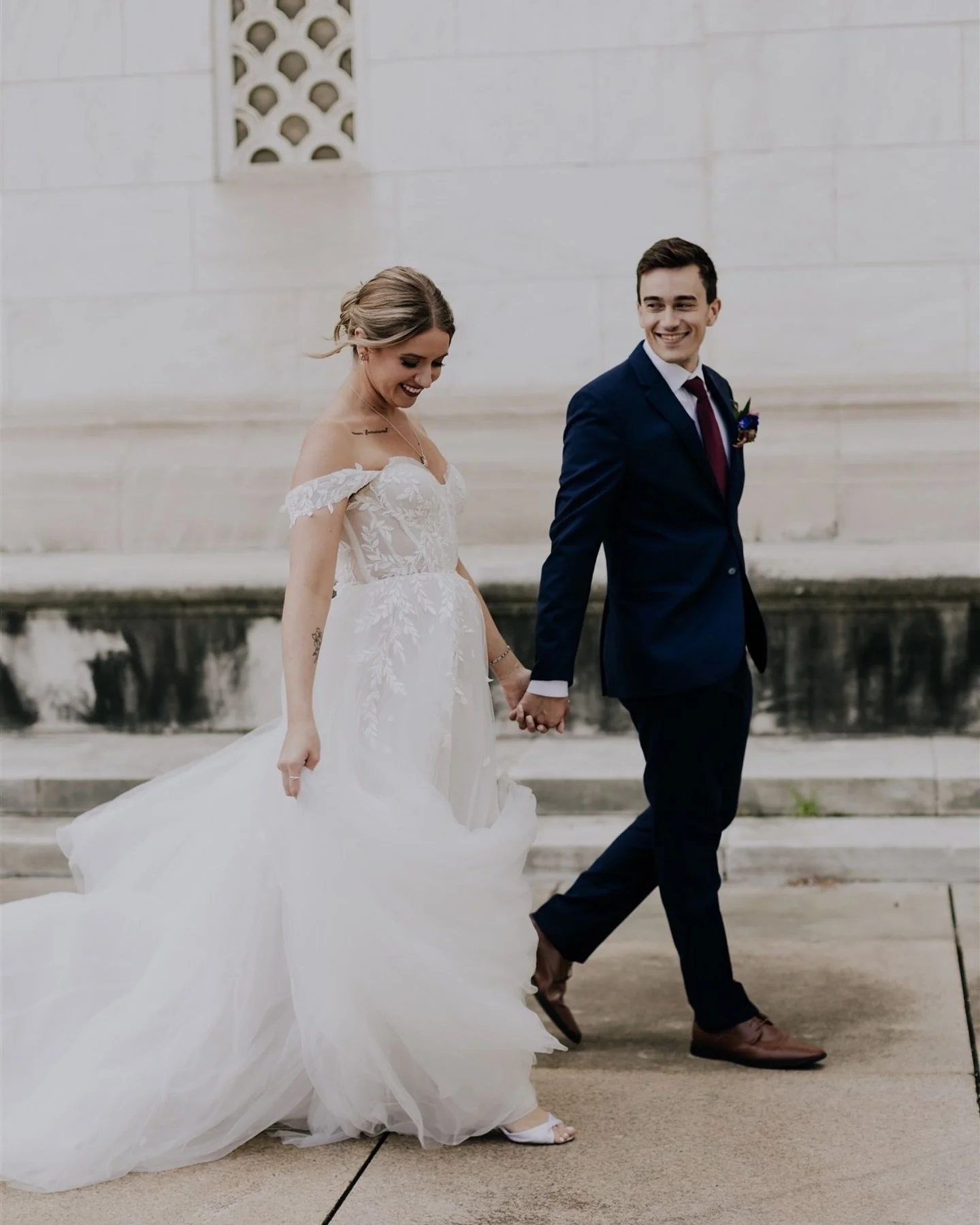 ✨ Industrial romance meets timeless elegance. This dreamy day at The Whiskey Factory was full of love, laughter, and the sweetest details, from the bride&rsquo;s flowing off-the-shoulder gown to the rich burgundy and blush tones that filled the room.