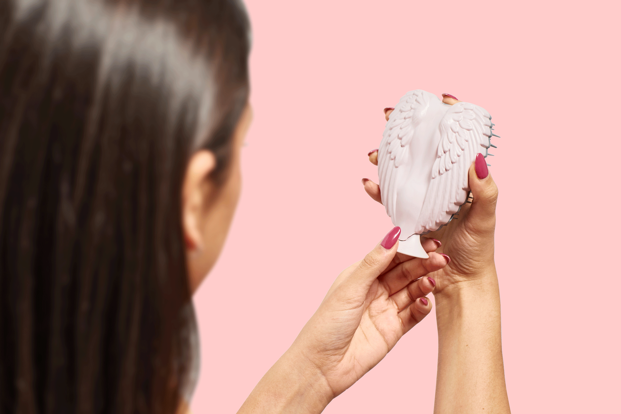 Model demonstrating Tangle Angel Pop Up