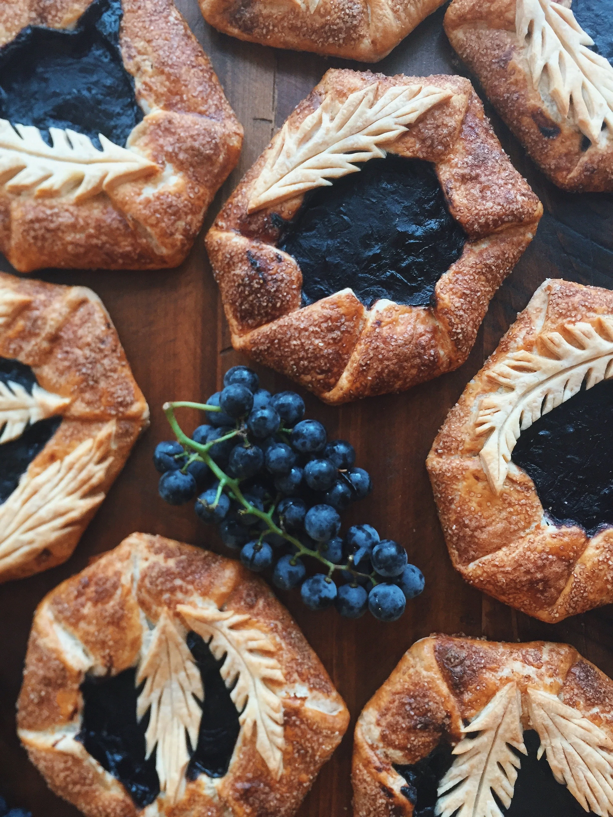 Concord grape galettes with freehand leaf decorations, 2015