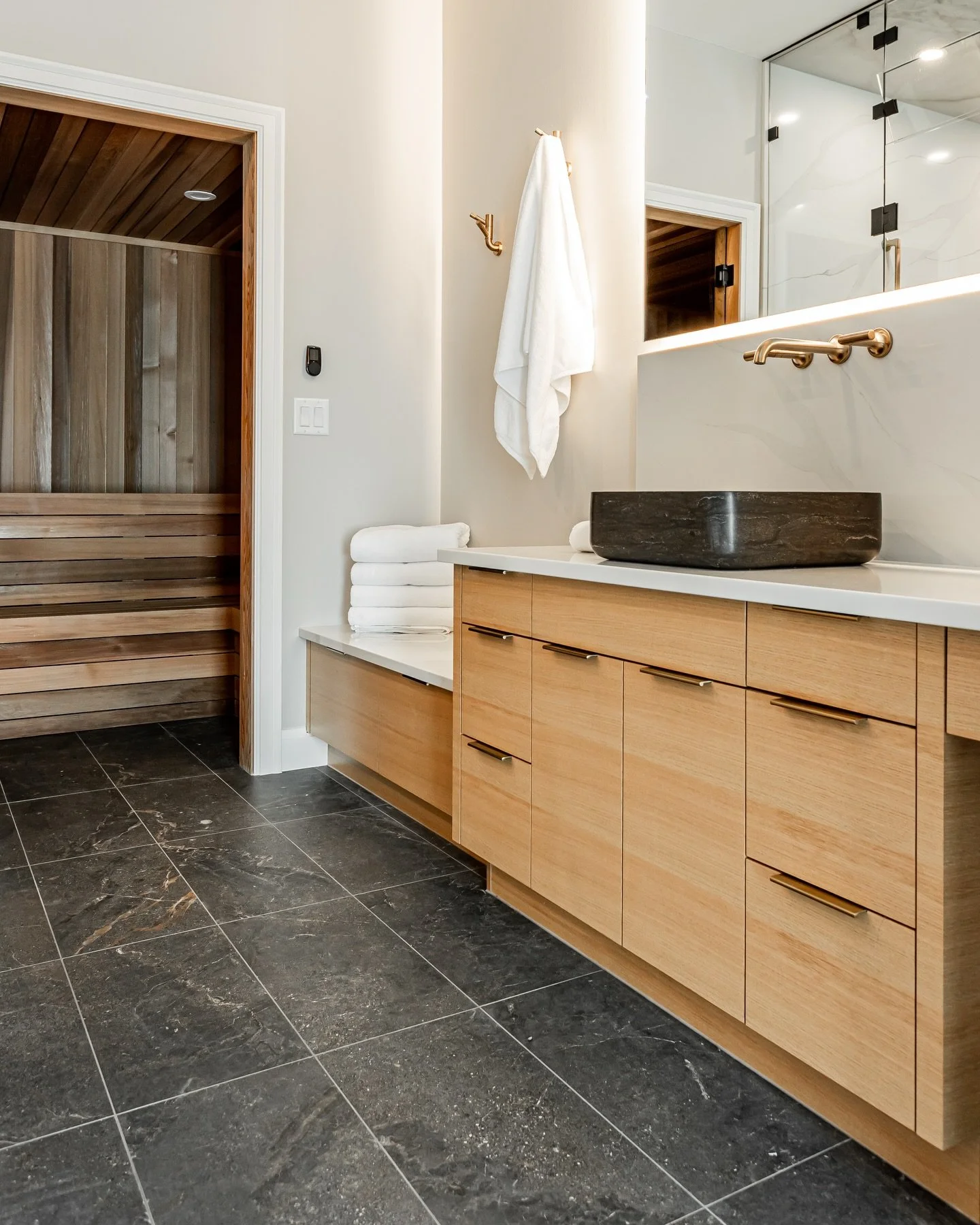 This Scandinavian-inspired home spa is the perfect space for my clients to unwind after a stressful work day. Equipped with a steam shower, rainfall fixture, infrared sauna and all the finishes to make you feel like you&rsquo;re lost in peace. 

Proj