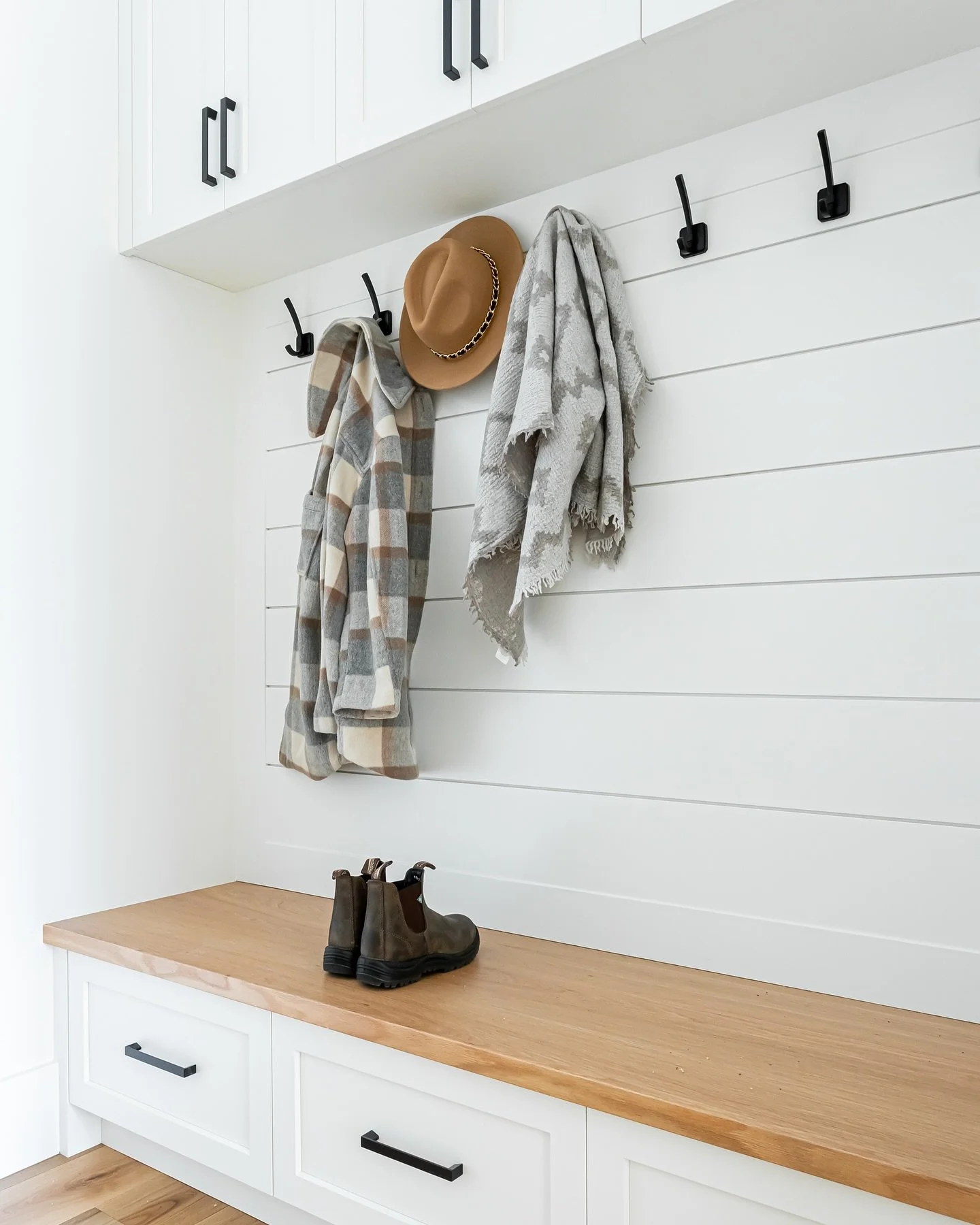 Mudrooms create function and storage no matter the family size. Tuck away your boots, coats and bags from your front door entry. Mess is out of sight, mess is out of mind! 

Project: Topham Estates | Rancher
Design: @shayeinteriors
Contractor: @steve