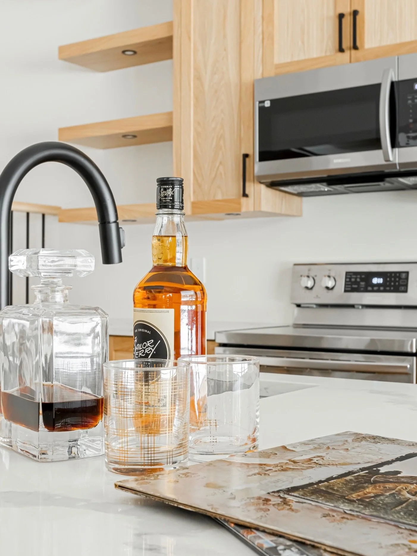Warm woods, bold stone, and clean lines&mdash;this recreation space is modern and inviting. Sleek floating shelves to the dramatic fireplace, every detail balances texture and tone with purpose. 🥃

Project: Topham Estates | Rancher 
Design: @shayein