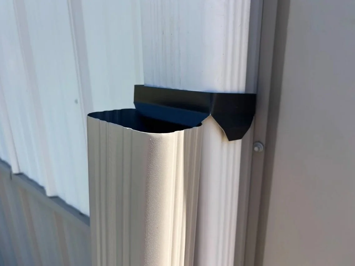 The Foxtail Flip Slide Retainer for Hinged Downspouts