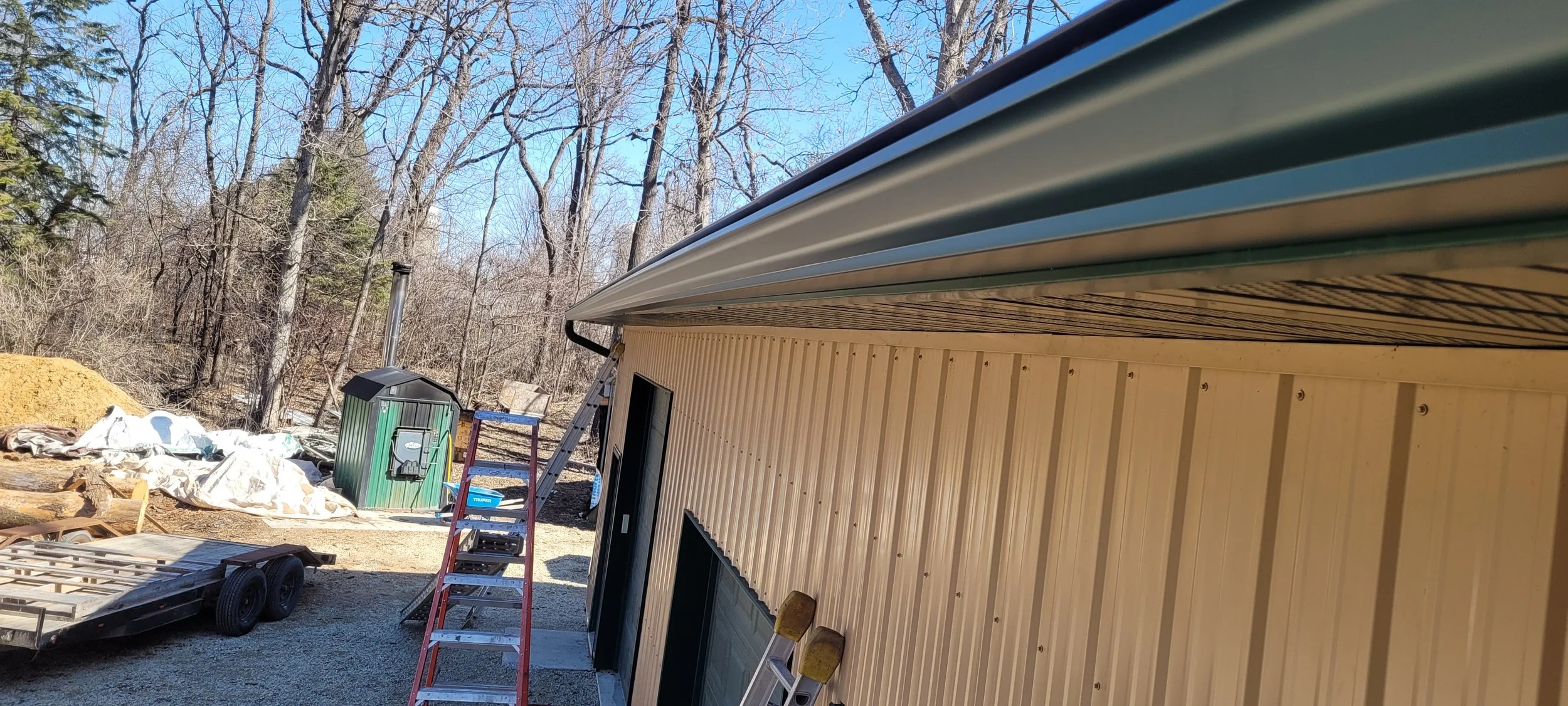 Green gutter on a shop