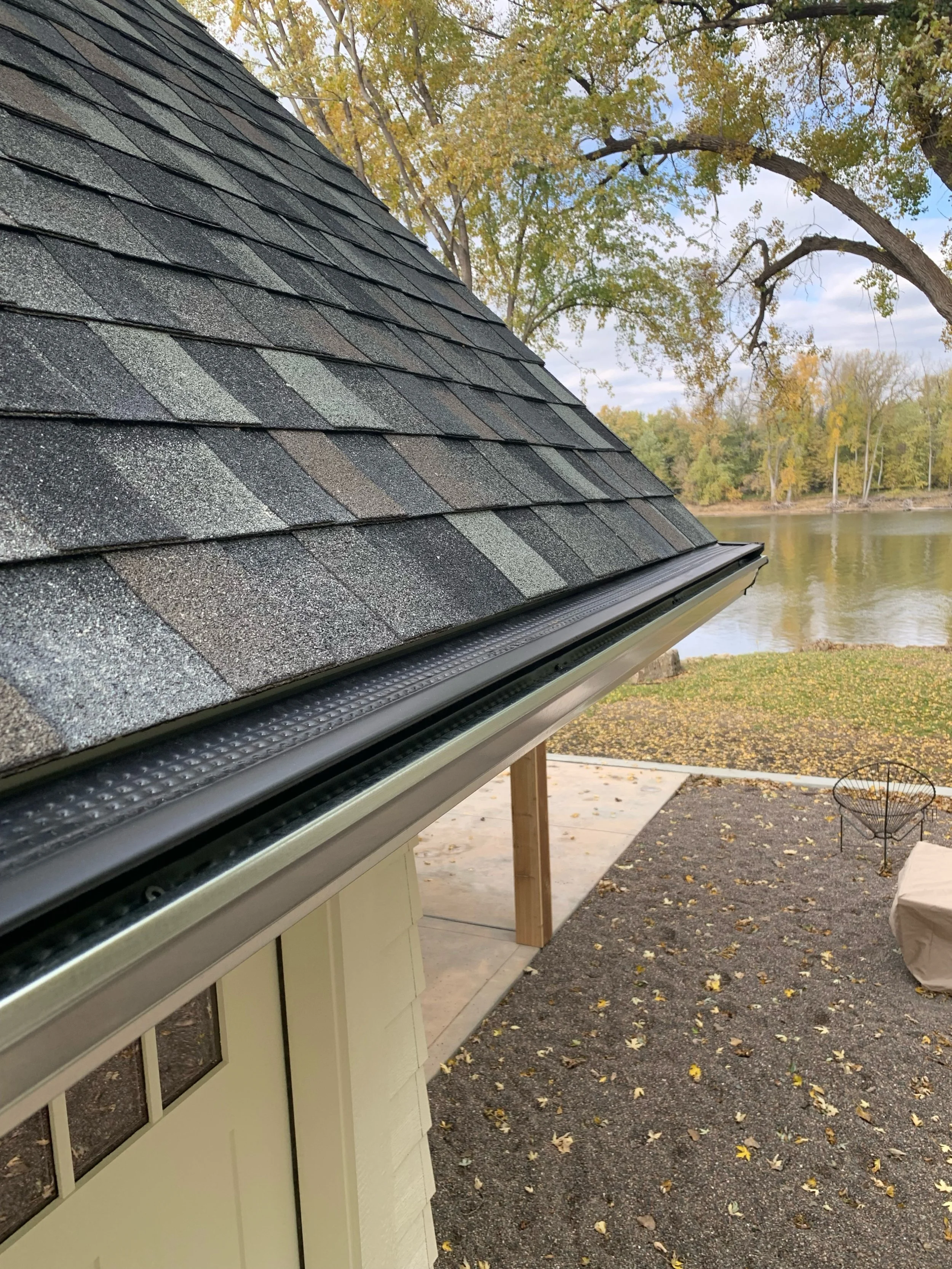FoxGuard Gutter Covers on a galvanized gutter on the Mississippi River