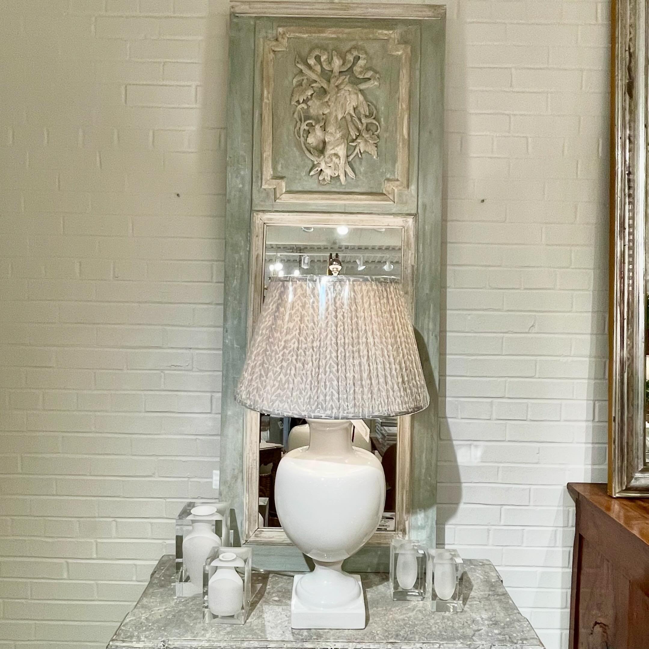 So pretty&mdash;love this beautiful @fermoie lamp shade paired with this French trumeau mirror. So good! We have a great selection of Fermoie shades in stock right now and another shipment heading our way! #heritageclt #curateddecor #europeanantiques