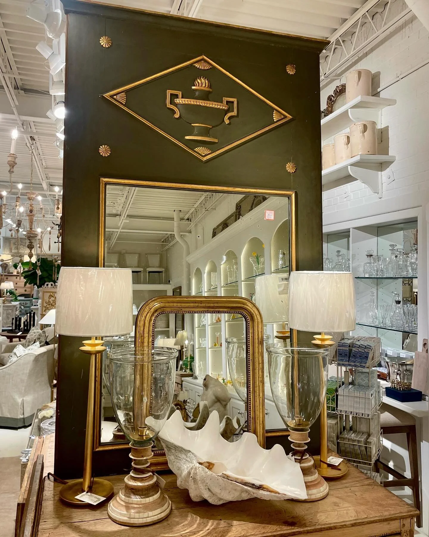 Such a showstopper! Antique Empire Period Gilt Mirror. French, c.1820. Dimensions are 43.5W x 71H. Discover our extensive collection of one-of-a-kind, hand-selected European Antiques and Curated Decor. Find more details and pics on our website at www