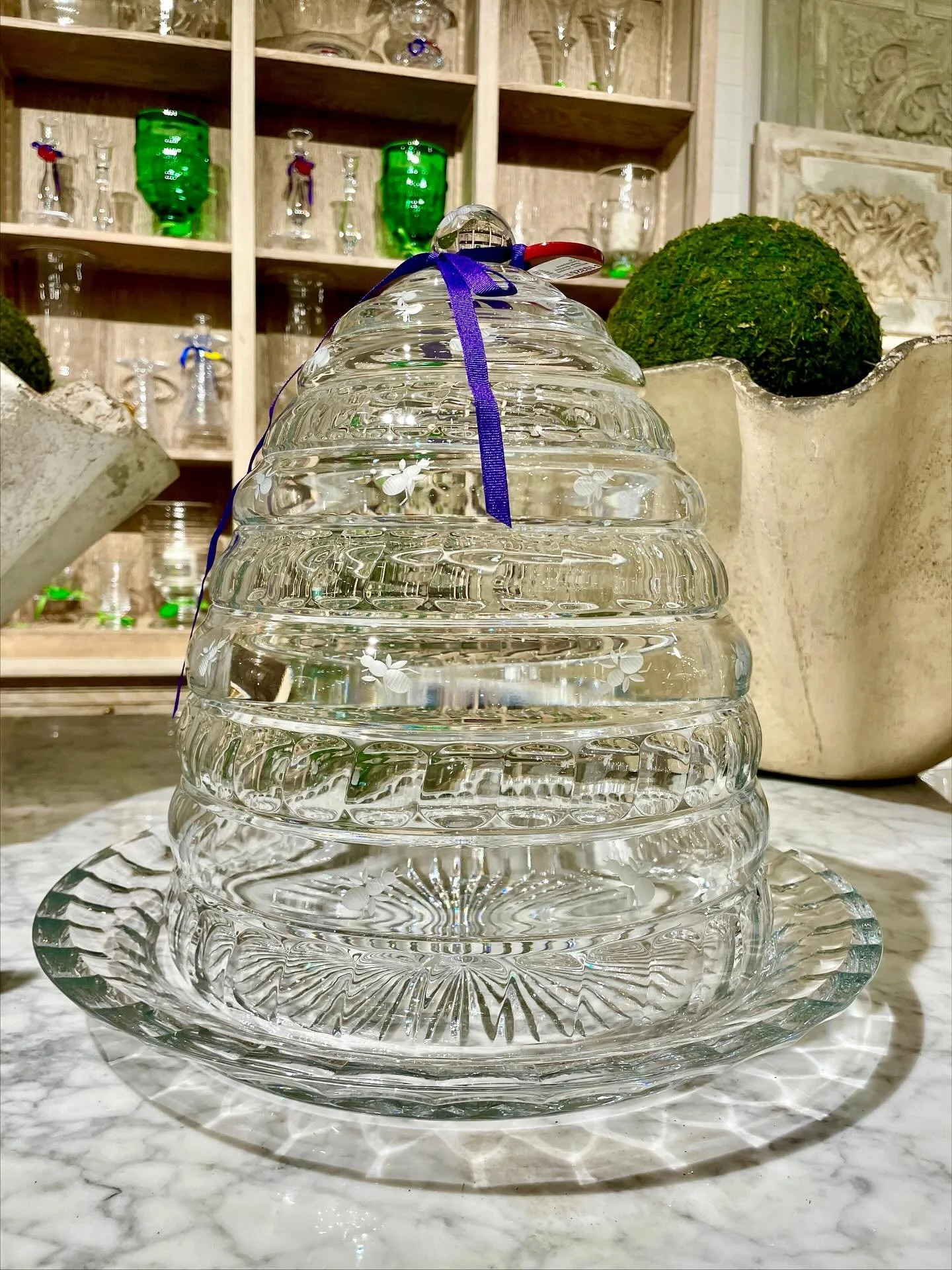 One of the prettiest new @williamyeowardcrystal pieces in the shoppe&mdash;the Rosa Beehive Centerpiece. Hand cut facets and bees surround the lid and base. A wonderful centrepiece on the dining table or sideboard, filled with fruit or whatever takes
