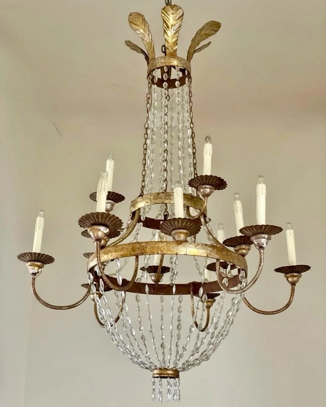 En Route. One of the prettiest Antique Empire Crystal Chandeliers! Italian (Florence), c.1820. Dimensions are 37.4D x 55.1H. Discover our extensive collection of one-of-a-kind, hand-selected European Antiques and Curated Decor. Find more details and 