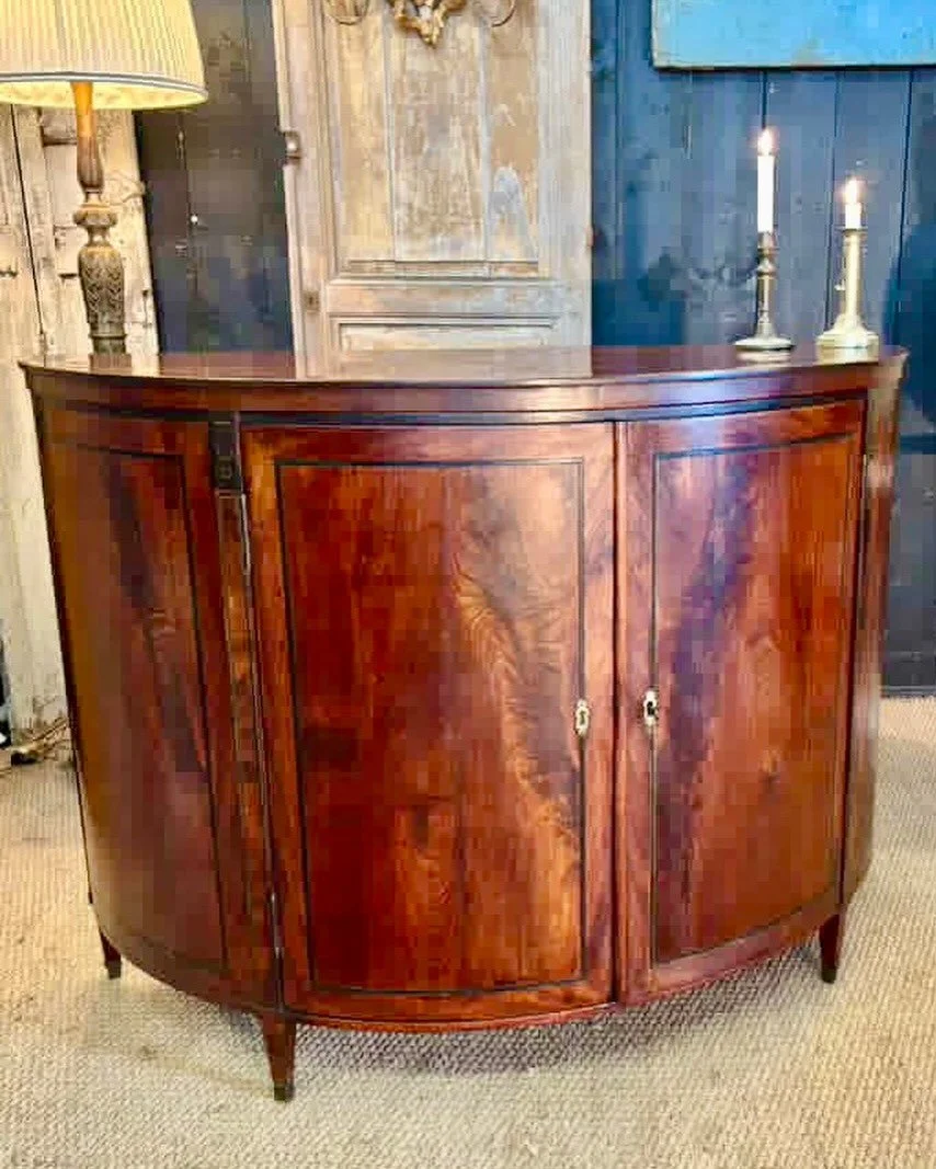 En Route&mdash;Antique Directoire Period Mahogany Demilune Server with Ebony Inlay. French, c.1810. Dimensions are 55W x 24D x 39.5H. Discover our extensive collection of one-of-a-kind, hand-selected European Antiques and Curated Decor. Find more det