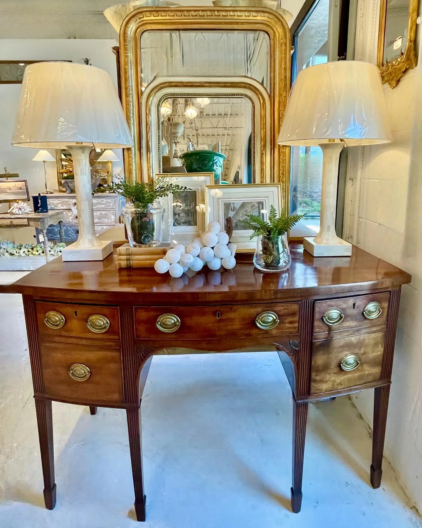 A gorgeous Antique Georgian Period Mahogany Bow Front Sideboard. English, c.1830. Dimensions are 53.5W x 27D x 36H. Perfect size for a smaller-scale space! Discover our extensive collection of one-of-a-kind, hand-selected European Antiques and Curate