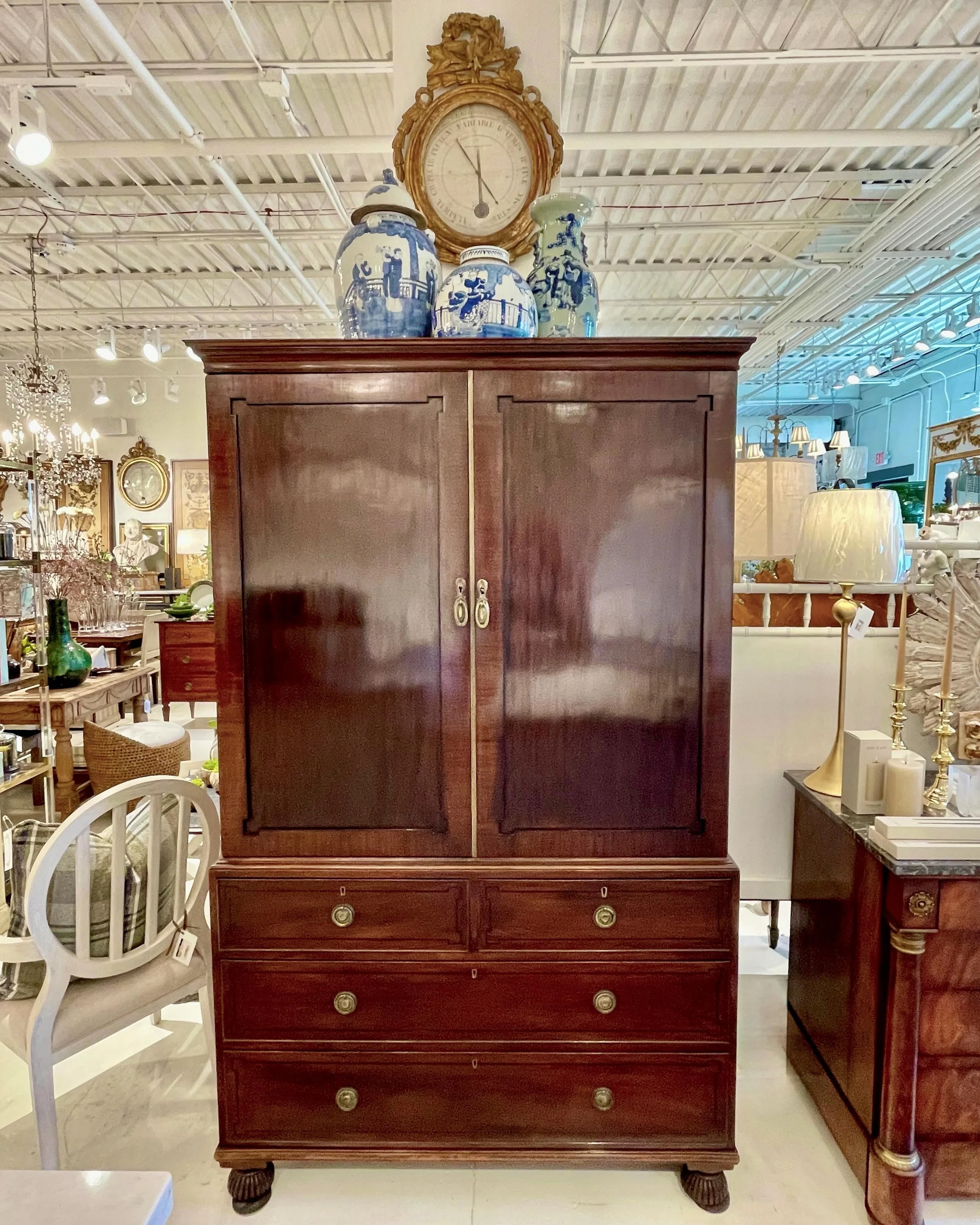 Antique Georgian Period Mahogany Linen Press with Ebony Wood Inlay. English, c.1800. Dimensions are 48W x 22.2D x 78.8H. Discover our extensive collection of one-of-a-kind, hand-selected European Antiques and Curated Decor. Find more details and pics