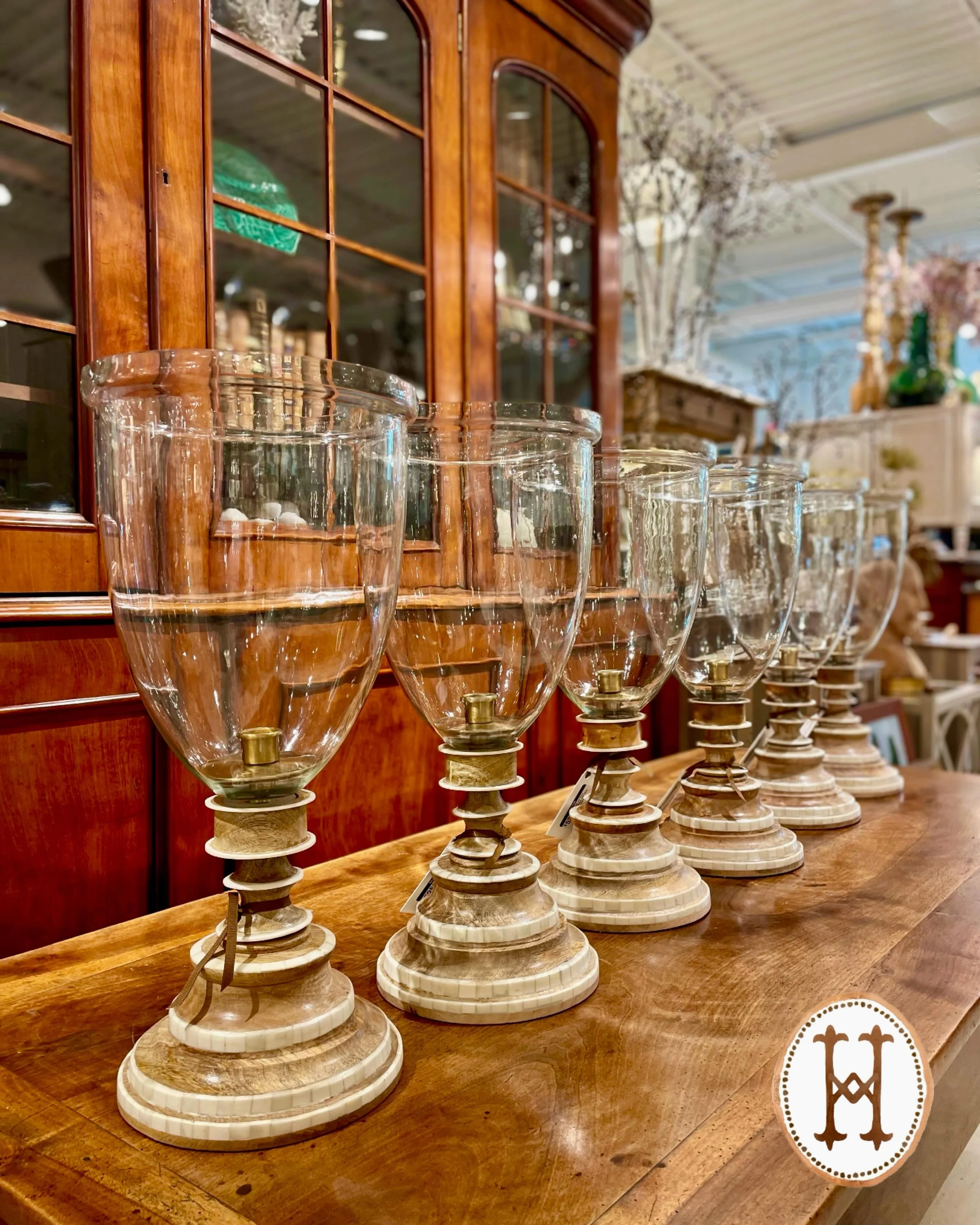 Our very popular Carved Wood and Bone Hurricanes are back in stock! Get them while we have them! Discover our exciting collection of one-of-a-kind, hand-selected Curated Decor. For more information:
&bull;Call: 704-496-9612
&bull;Email: sales@heritag