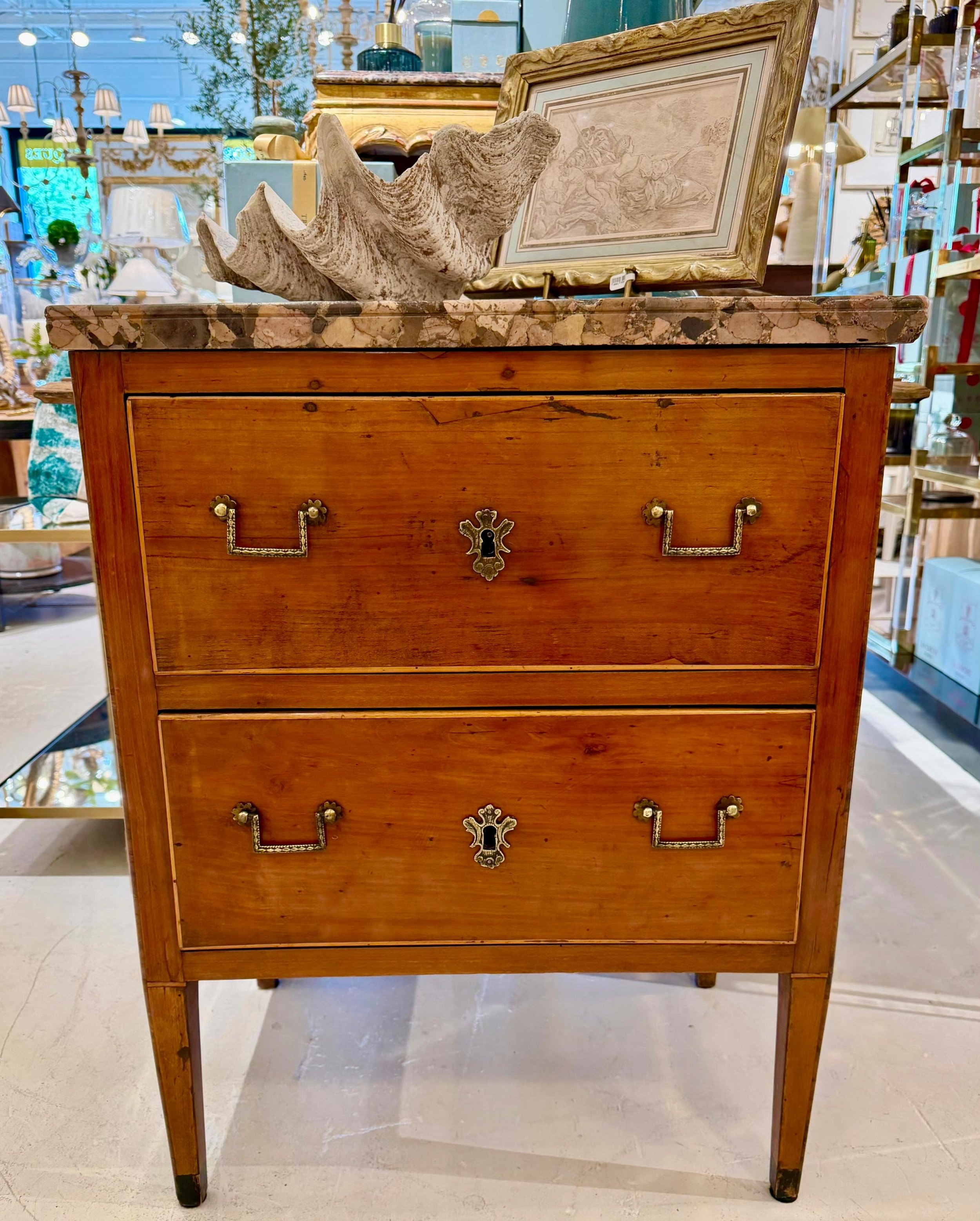 One of the absolute prettiest petite chests! Antique Walnut Marble Top Chest. Italian, c.1800. Dimensions are 25W x 16.25D x 31.5H. Discover our extensive collection of one-of-a-kind, hand-selected European Antiques and Curated Decor. Find more detai