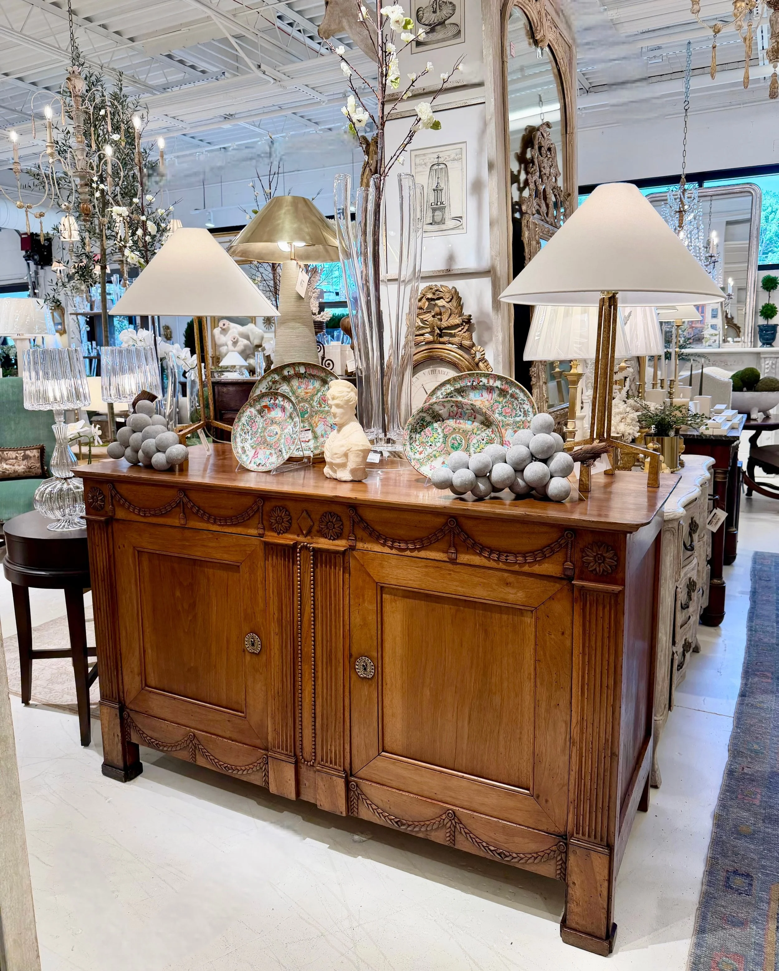 Impeccable hand carving details! 
Antique Walnut Buffet with Hand Carved Swag and Rosette Details. 
Italian, c.1850. 
Dimensions are 64.1W x 25.1D x 38.1H. 
Discover our extensive collection of one-of-a-kind, hand-selected European Antiques and Curat