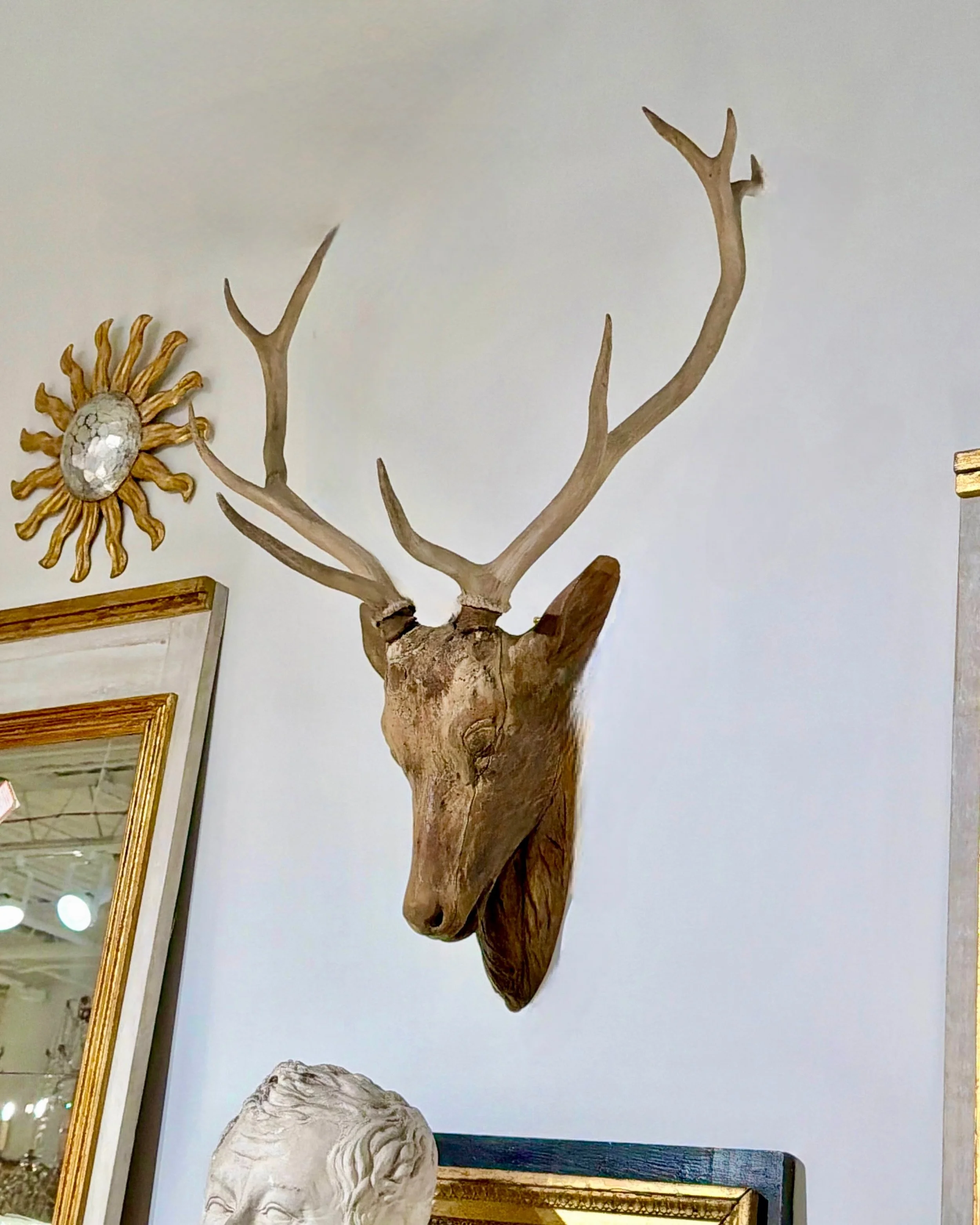 This handsome fella just arrived in our last container. Antique Hand Carved Deer Head Trophy Mount. French, c.1820. Dimensions are 26.3W x 34.6H. Discover our extensive collection of one-of-a-kind, hand-selected European Antiques and Curated Decor. F