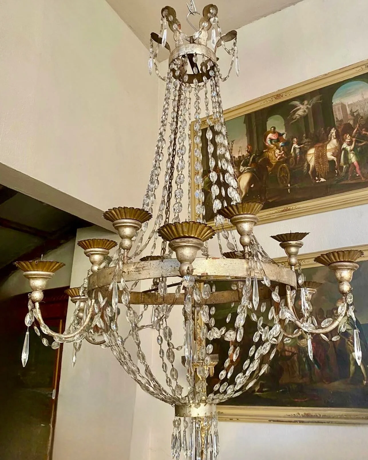Coming Soon&mdash;An Antique Empire Period Silver Gilt 12-Light Crystal Chandelier. Italian, c.1780. Dimensions are 35.4D x 55.1H. All original crystal. Discover our extensive collection of one-of-a-kind, hand-selected European Antiques and Curated D