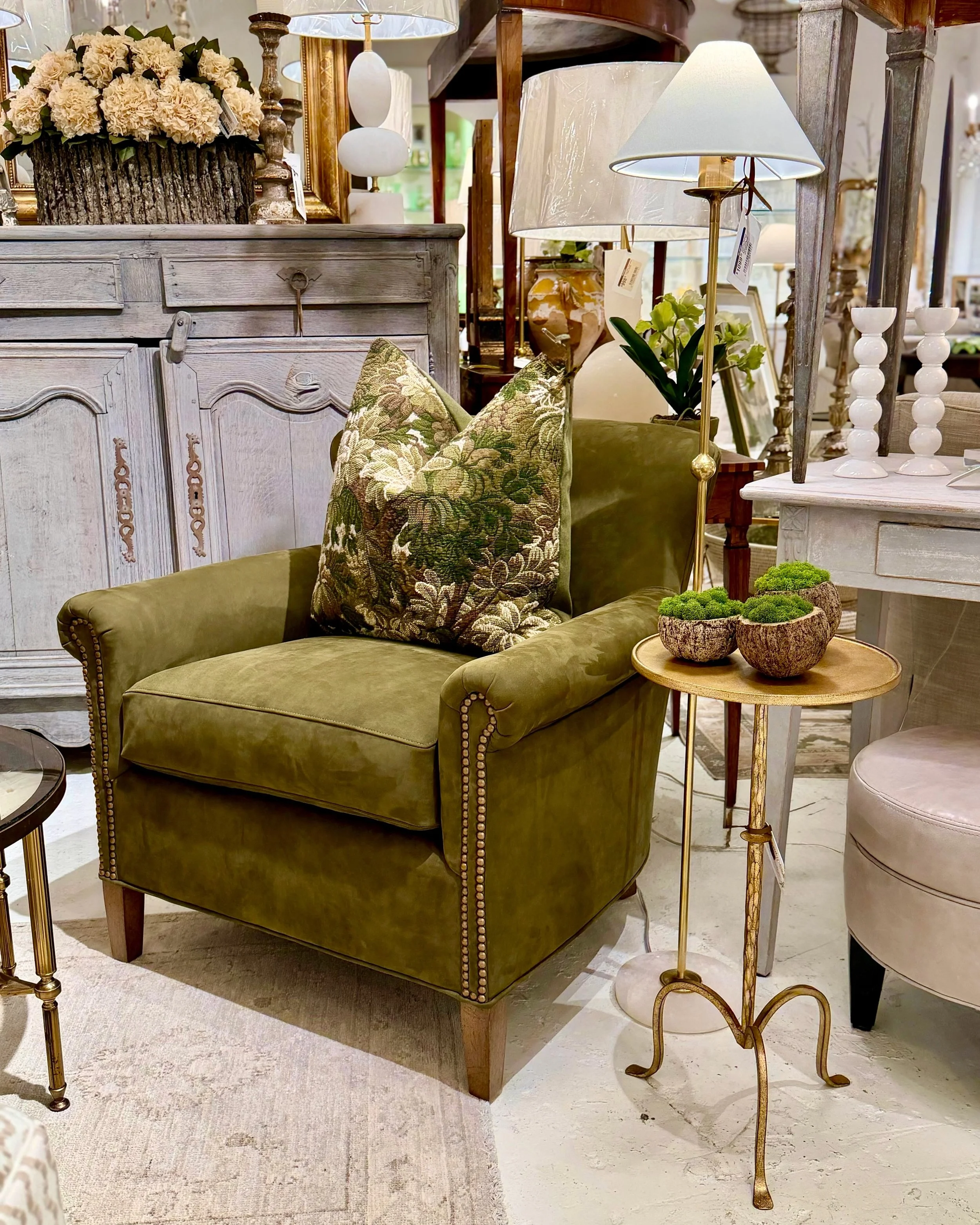 New in the Shoppe&mdash;a beautiful pair of green leather @wesleyhallfurniture club chairs with the perfect nail trim detail. So comfy! So right! Discover our exciting collection of hand-selected Custom Upholstery and European Antiques. Find more det
