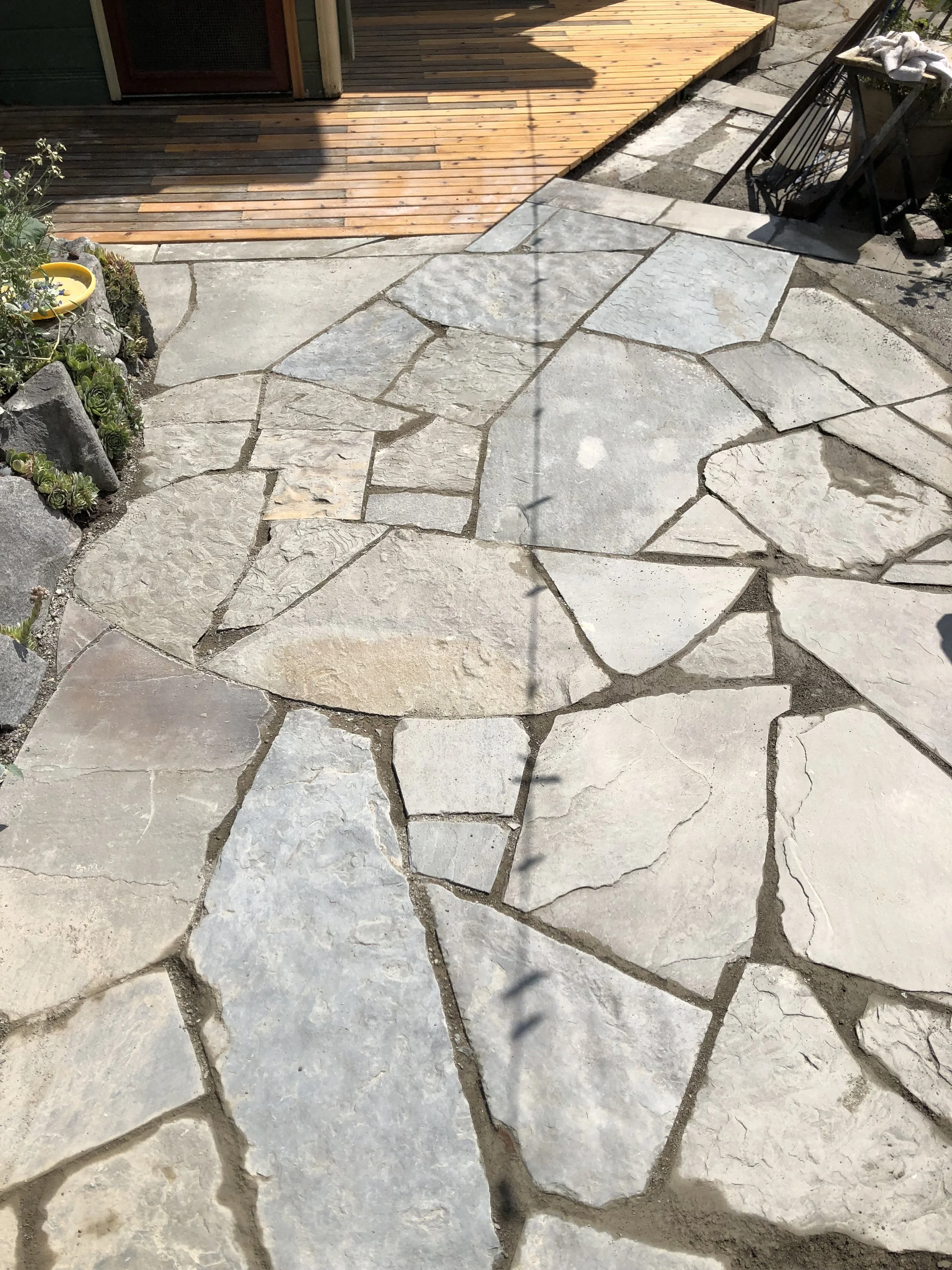 Stone patio in west Olympia; 2024