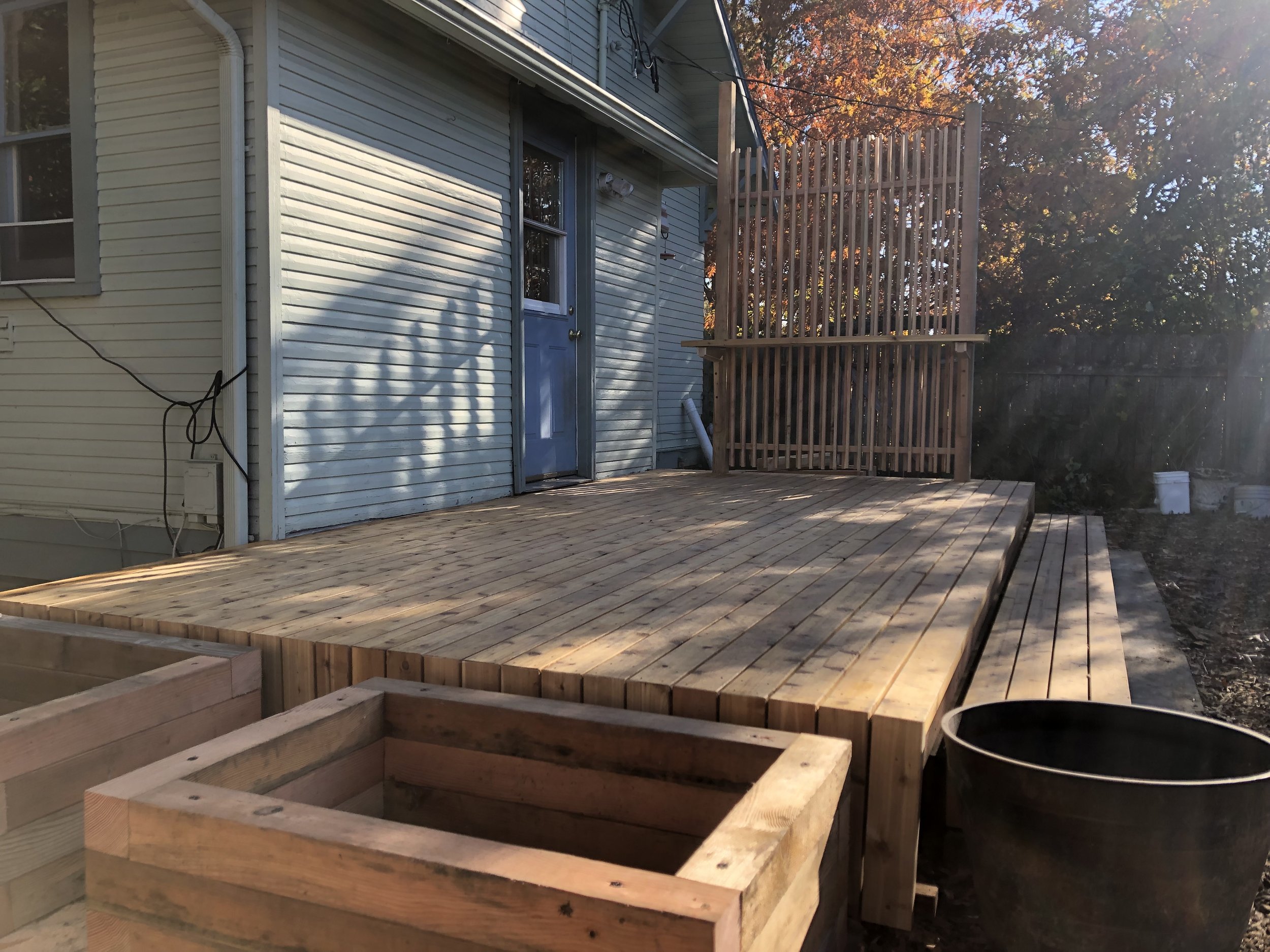 Small cedar deck with screen and garden boxes; 2022