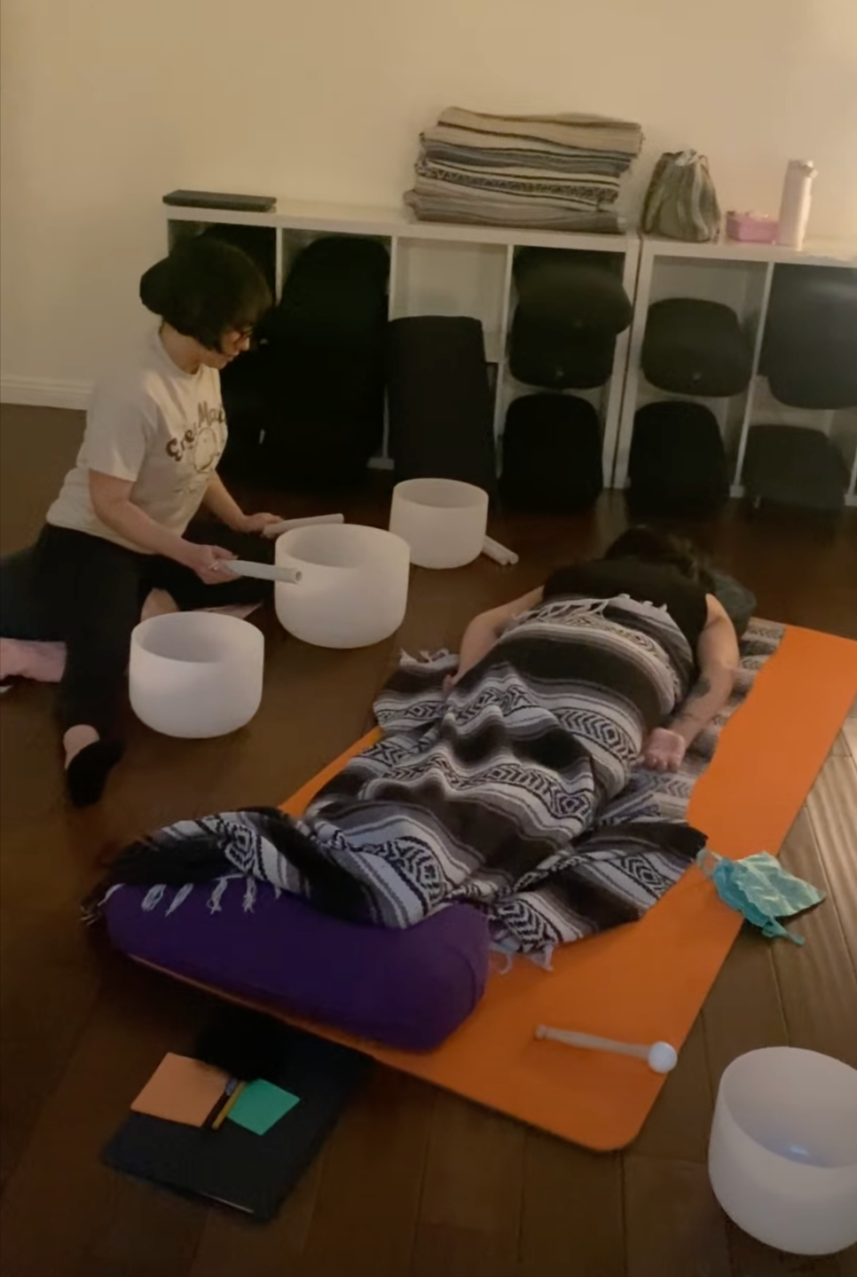 A student leading a soundbath during Day 2 of the certification training at The Mystic Living School