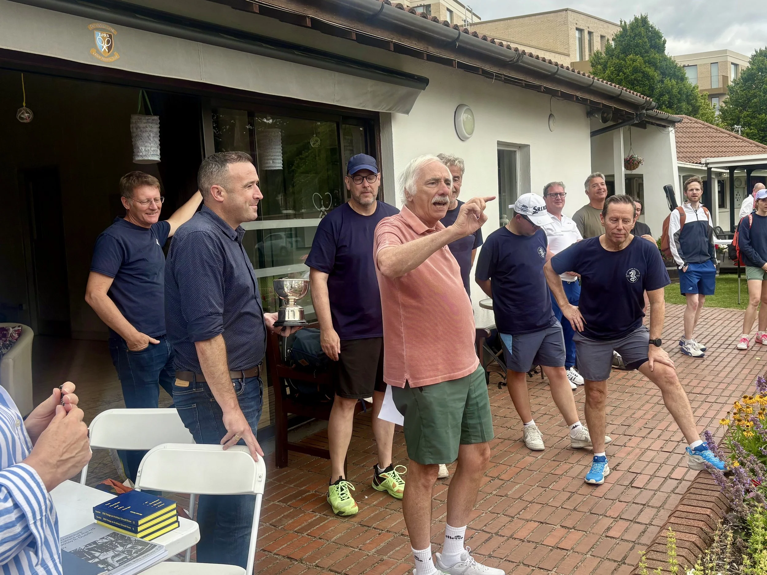 2026

Bryan O'Rourke who ran this tournament for decades was invited back to present the prizes - and to thank all of the architects for their support and for playing tennis in sunny Donnybrook LTC during the working day. Heroes one and all!