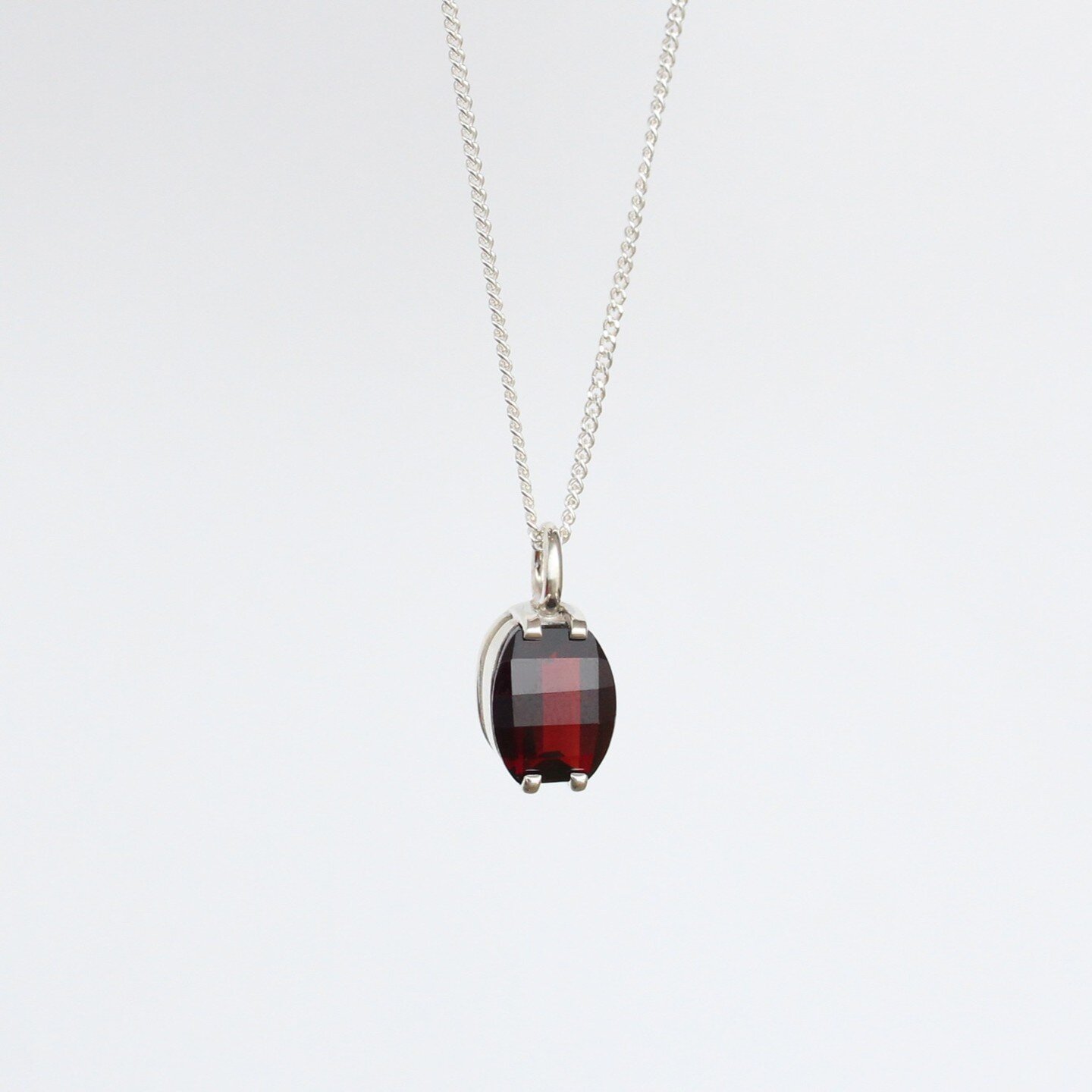 Stunning 4-claw cushion-shaped garnet pendant - handcrafted, custom-made and is as unique as is it alluring. 😍

Did you know garnets were once used as a talisman for protection by warriors going into battle and to ward off pestilence and plague? Tod