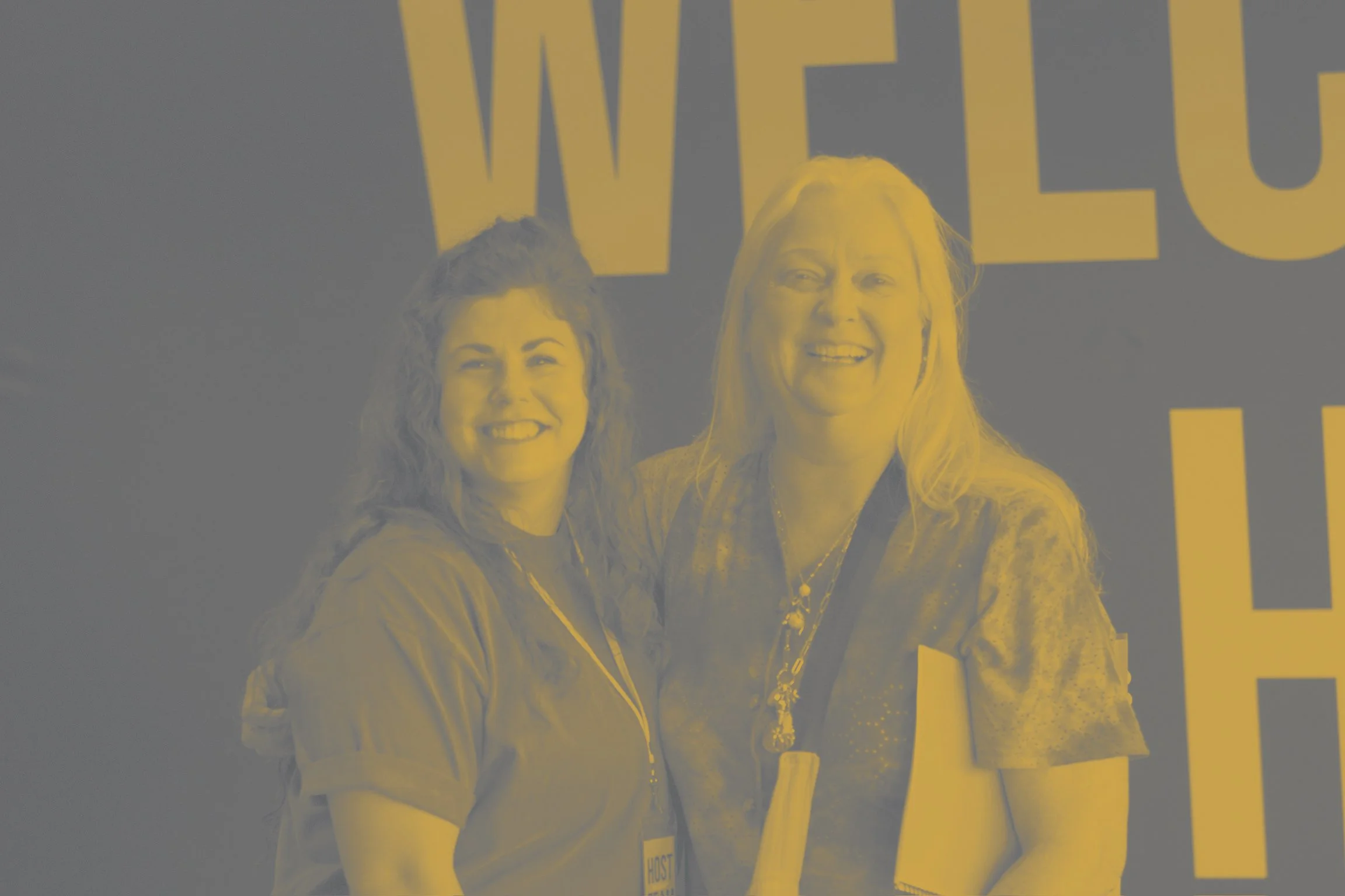 two women smiling at church on Sunday