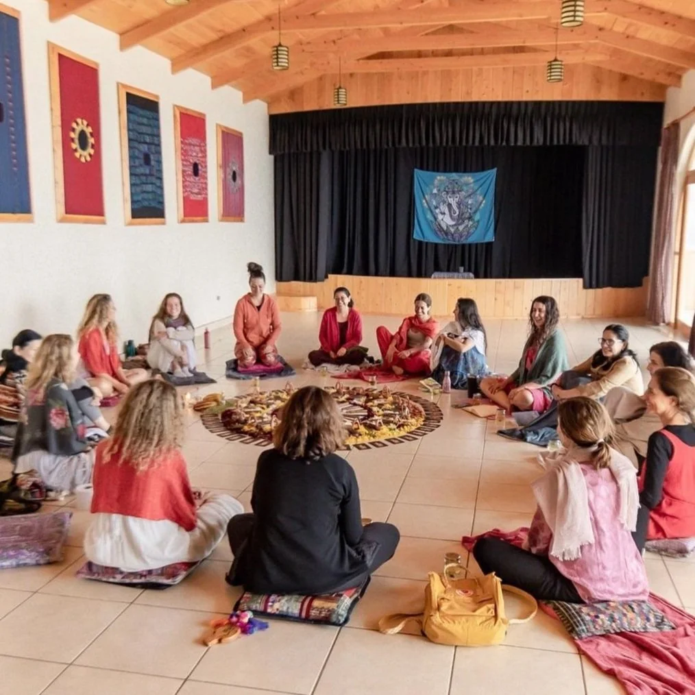 Group of women sitting in an Empowerment circle while connecting at the Rebirth Retreat hosted by Chivonne Monaghan