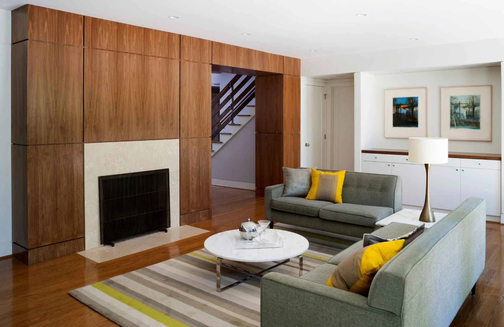 full-service-interior-design-herndon-park-va-wood-accents-in-home-contemporary-living-room-wood-accent-fireplace-wall-green-sofa-classic.jpg