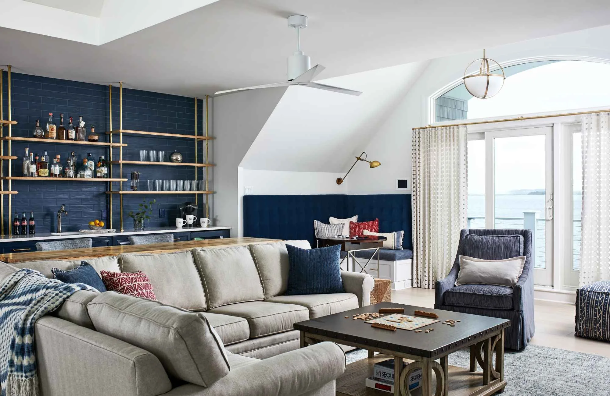 christie-leu-interiors-fairfax-va-custom-drapery-panels-living-room-with-bar-ocean-view-large-windows-blue-and-white-timeless.jpg