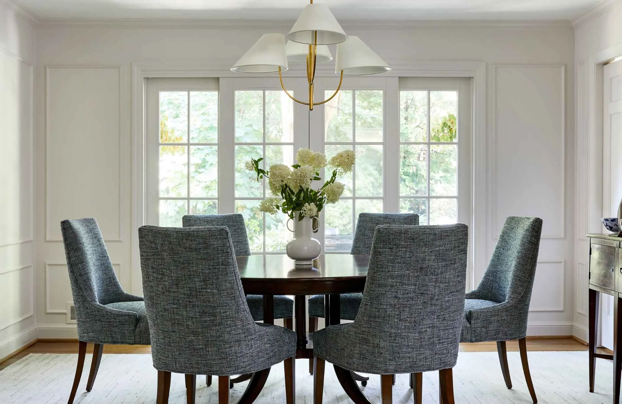 full-service-interior-design-fairfax-va-custom-home-professionals-dining-room-with-upholstered-chairs-french-doors-elegant.jpg