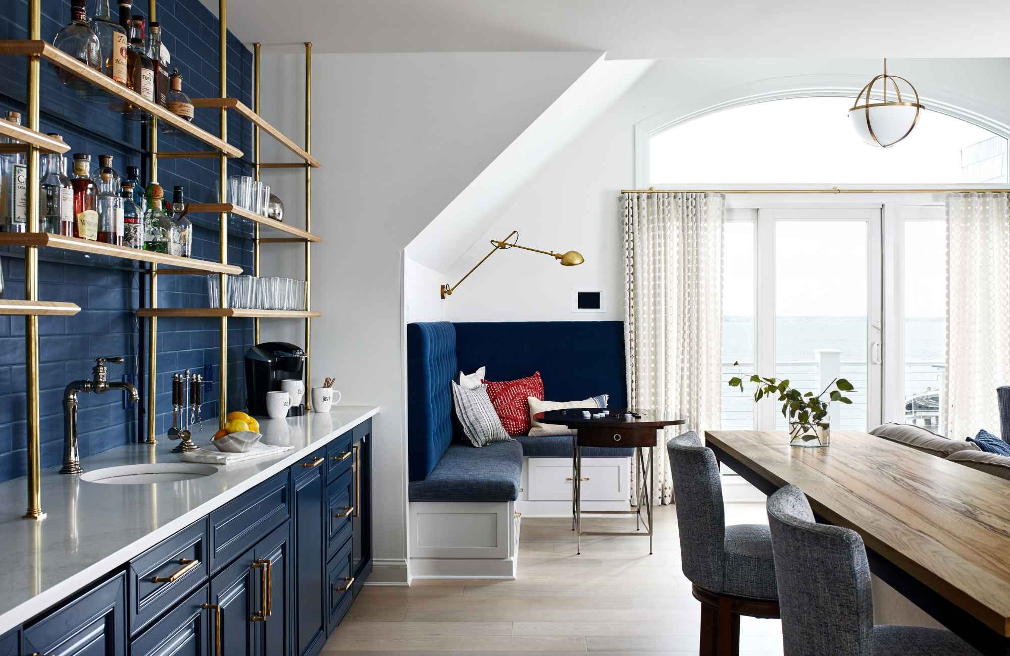 christie-leu-interiors-woodley-park-dc-custom-home-professionals-rec-room-navy-blue-built-in-bar-built-in-banquette-large-windows-beach-home-classic.jpg