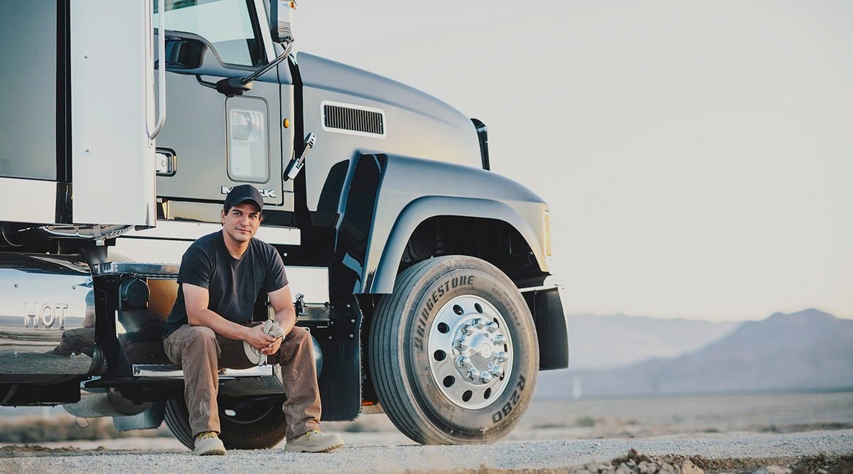 trucker outside truck.jpg