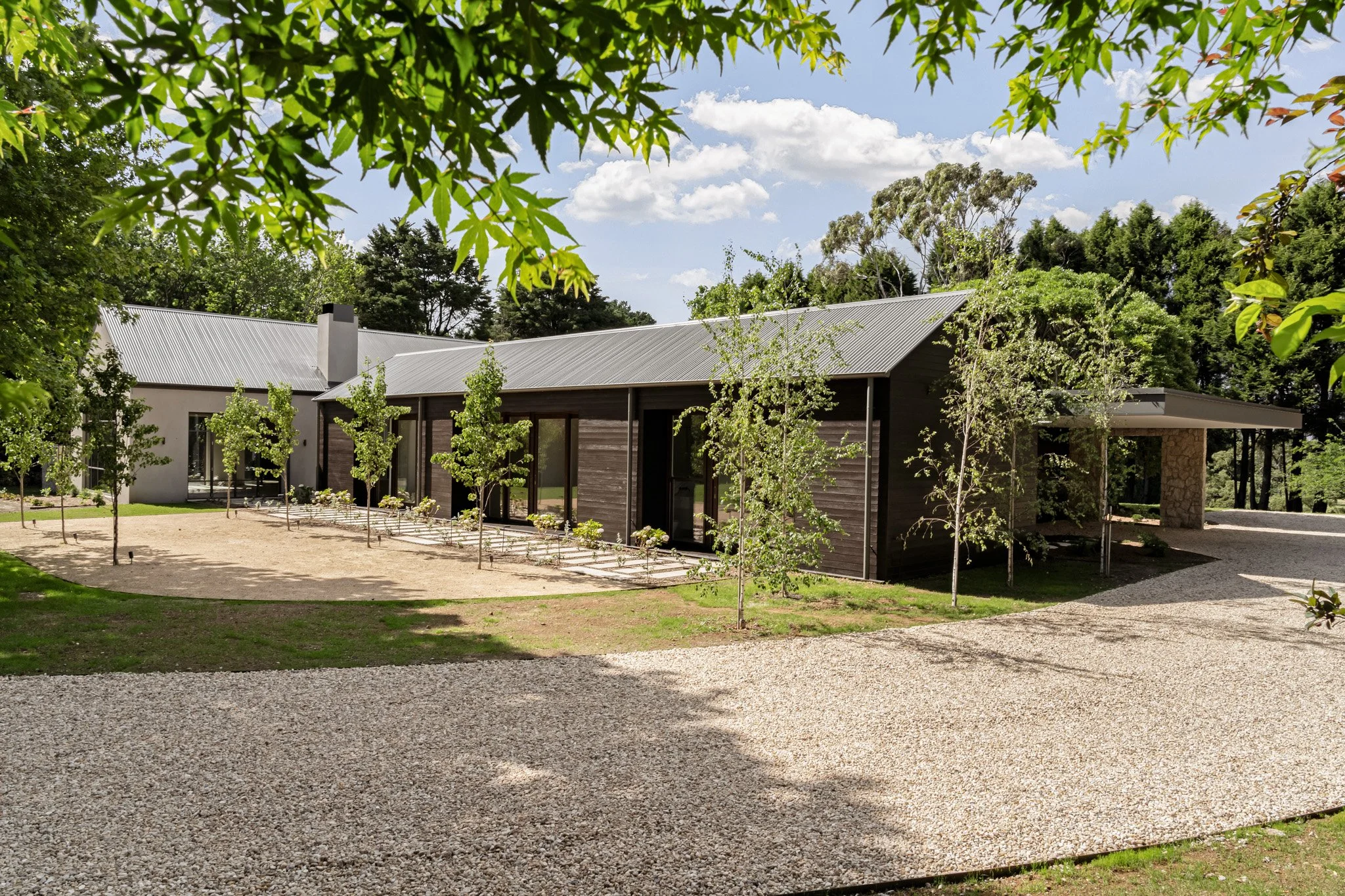 Contemporary country home set within landscaped gardens in the Southern Highlands, designed by Studio Harrington
