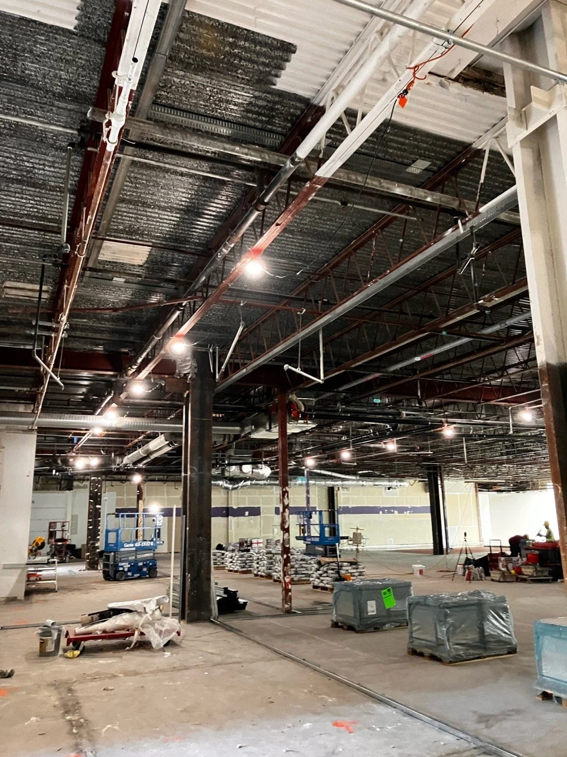 Electrical rough-in and conduit installation during H&amp;M retail tenant improvement