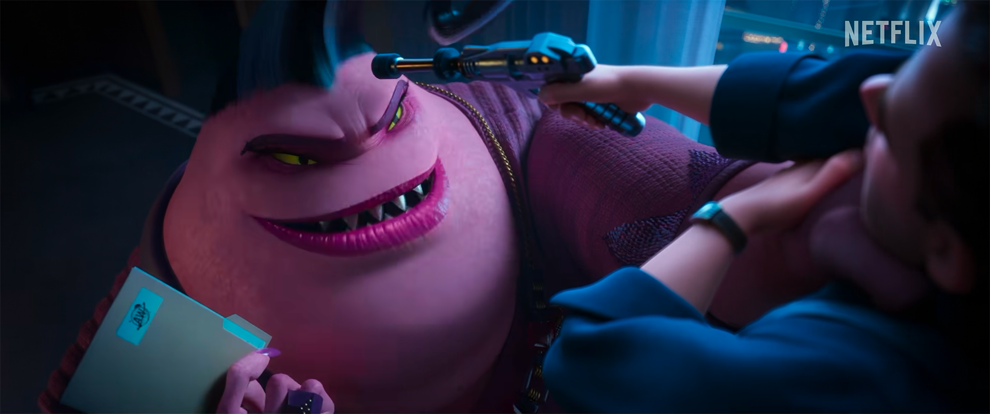A scene from a Netflix animated show featuring a large pink alien with sharp teeth, yellow eyes, wearing a purple top and gold necklace, lying on a surface while a person in a blue jacket holds a small tool near the alien's neck.