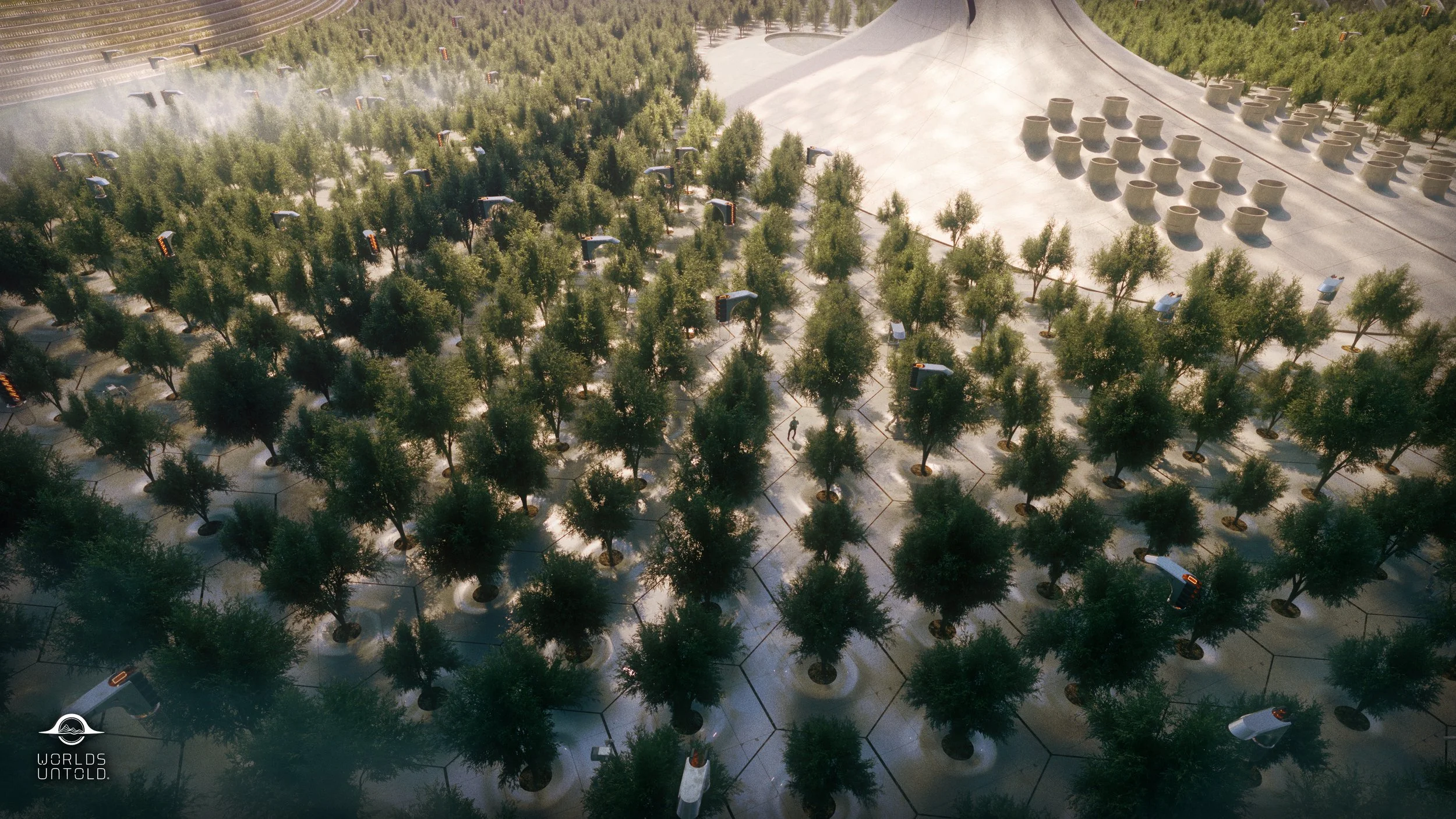 Aerial view of a large outdoor urban space with many trees planted in organized rows, surrounded by parking spaces with parked cars and some trees in large concrete pots. A section of the space has a paved area with streetlights.
