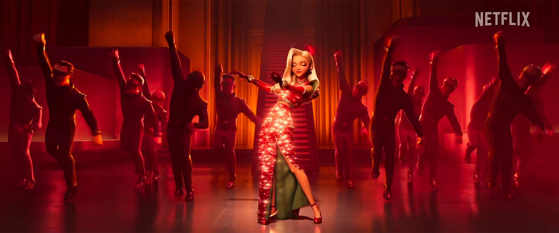 Animated music performance scene with a female singer in a glowing, sparkly red dress and fellow dancers in black outfits with brown gloves, all on stage illuminated by red lighting, with curtains in the background and a "NETFLIX" logo in the top rig