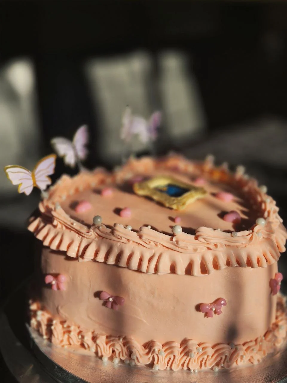 Heart shape cake with ana edible picture frame and gelatine bow-tie and hearts decorations