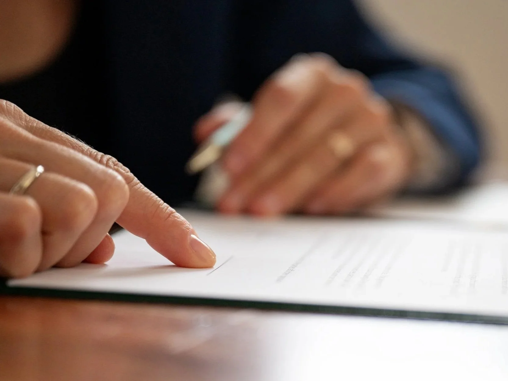 Notary Public in Plymouth notarising a document for a local small business
