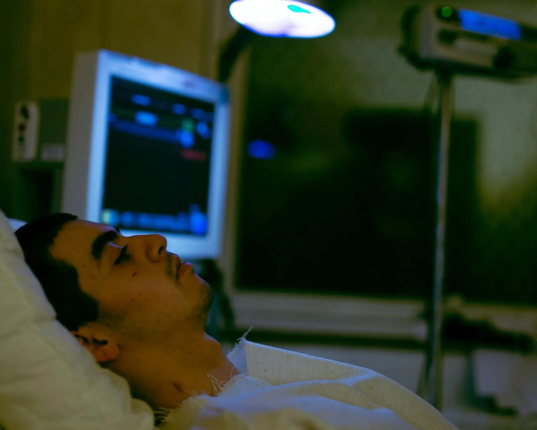 Patient lying in hospital bed following potential medical misdiagnosis