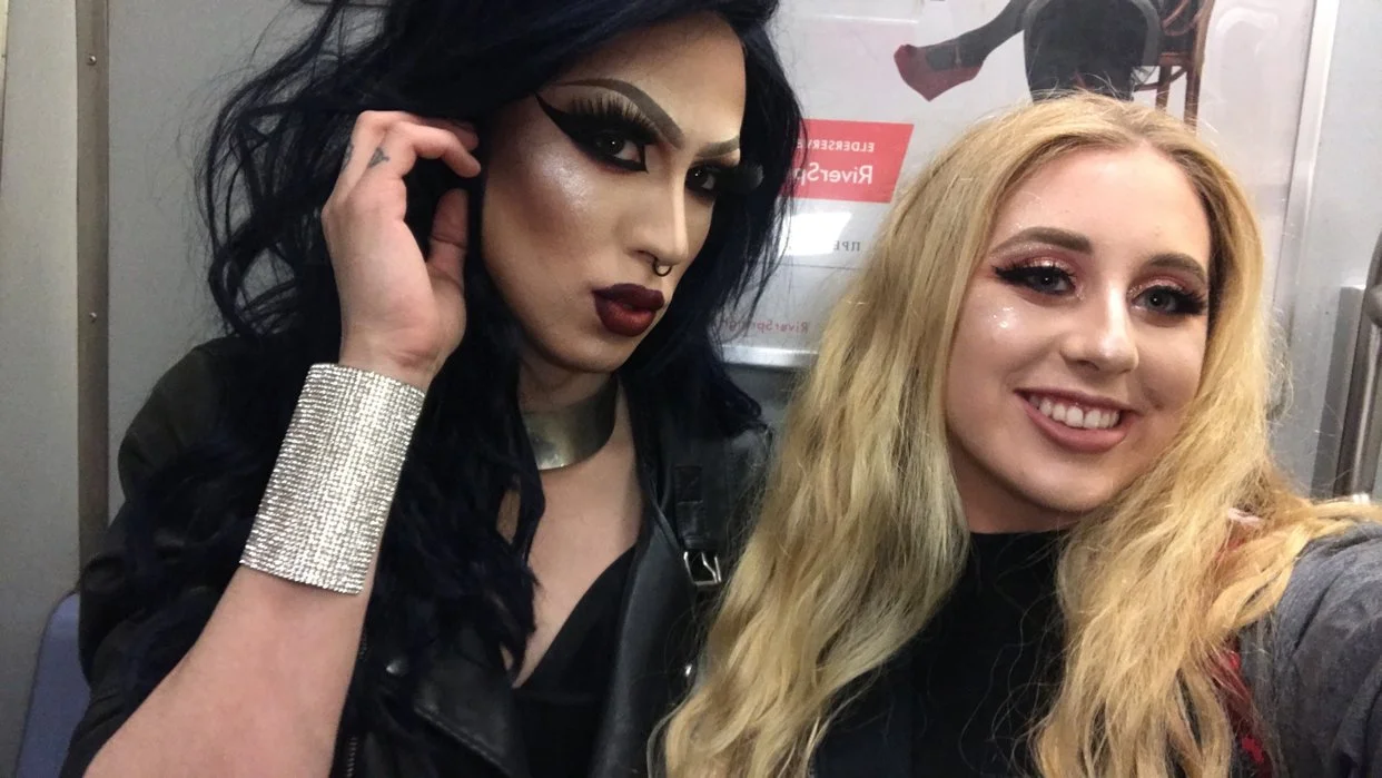 My friend and I traveling on the NYC subway to their drag show