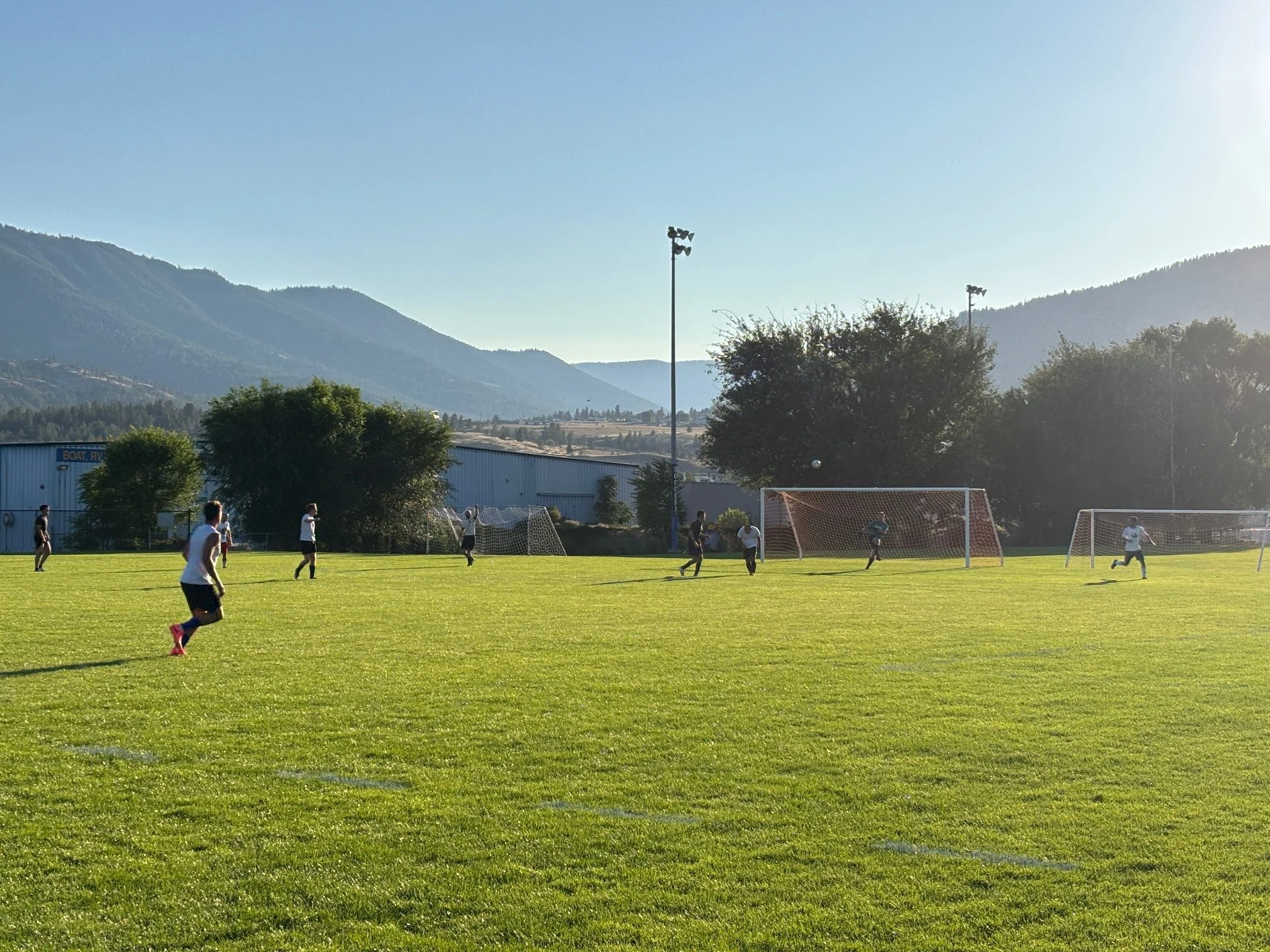 Goalie clearing the ball up the field in the game between Penticton and Osoyoos in the South Okanagan Men's Soccer League