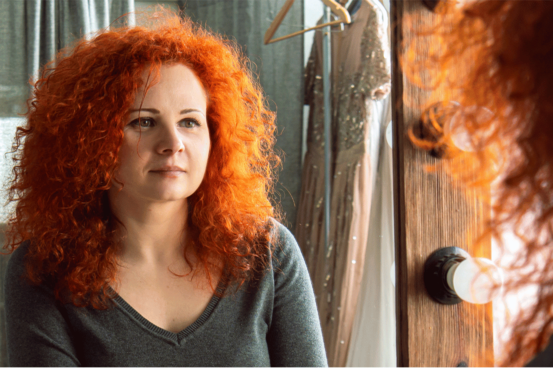 Midlife woman feeling invisible and wondering if therapy would help.