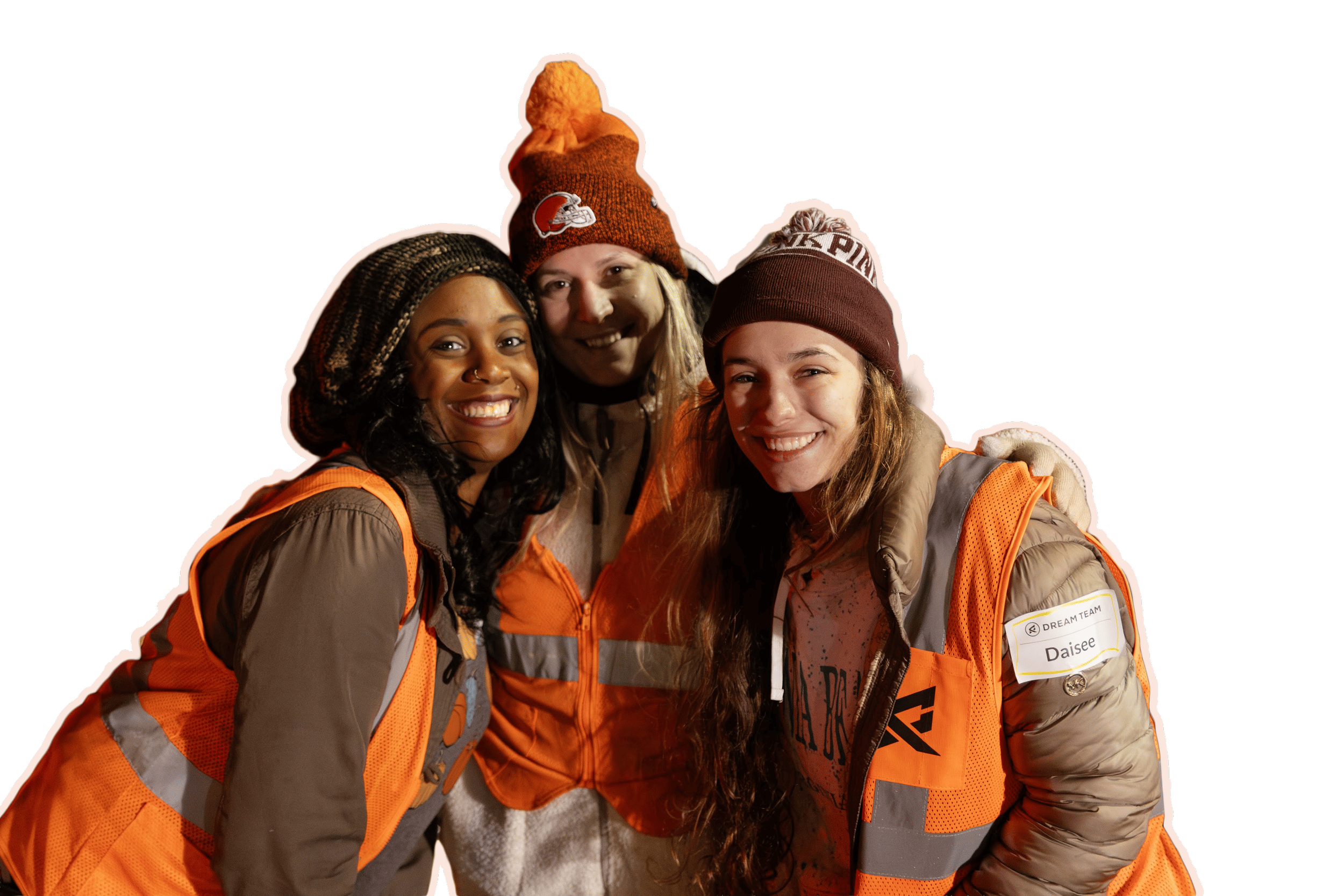 three female girls hugging while serving at thanksgiving outreach