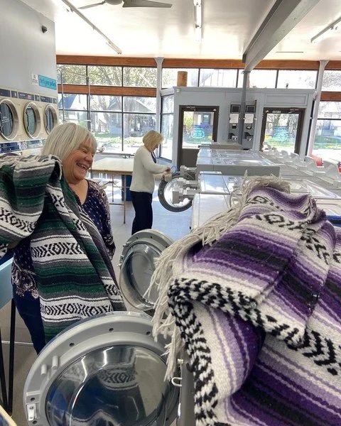 Blankets GALORE. 
This is no small task. But clean blankets make classes SO much better. That's why we are oh so appreciative to our volunteers who help load, wash, dry, wait for, fold, transport, and stack our studio blankets so things so fresh and 