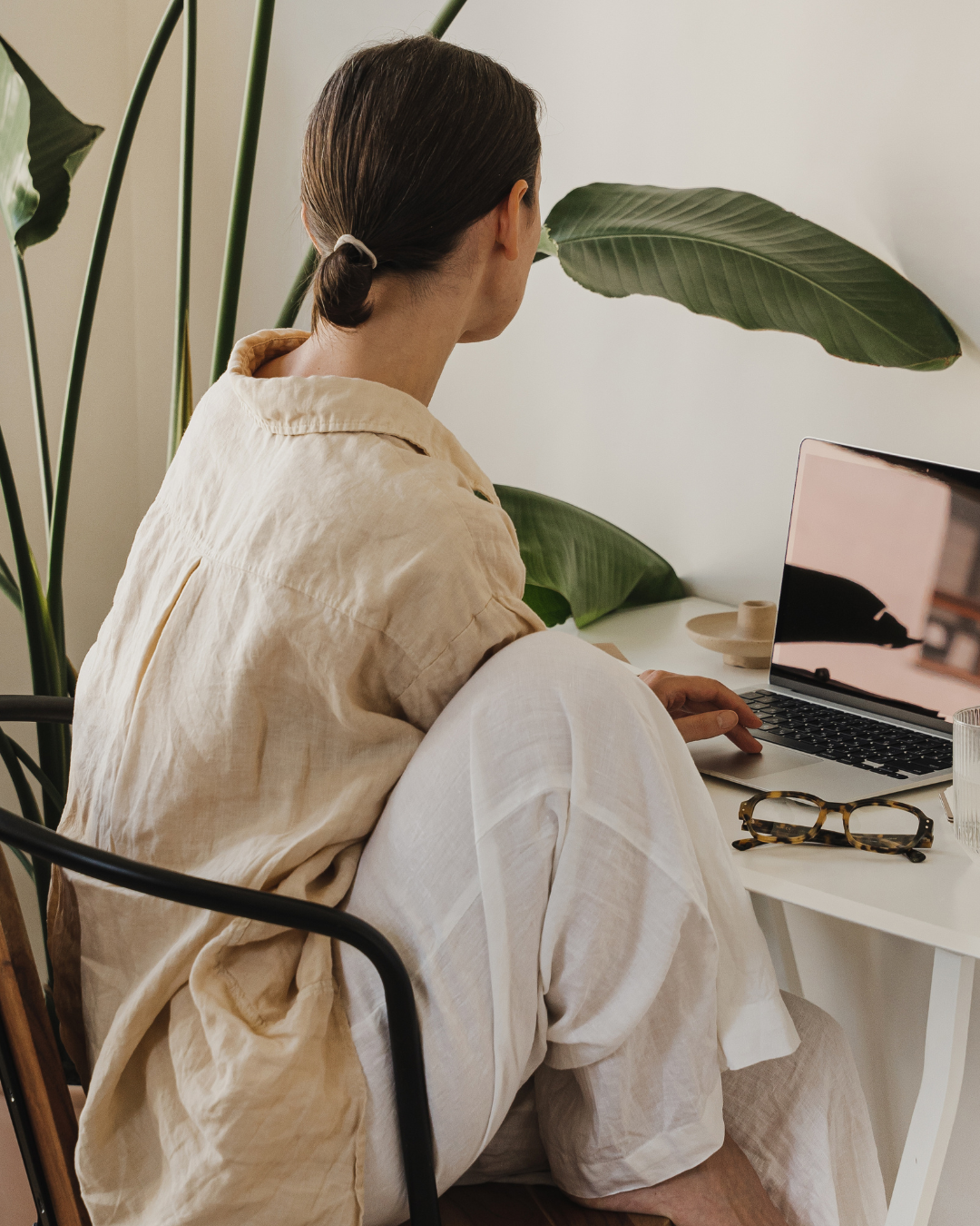 Human Design Projector at a computer