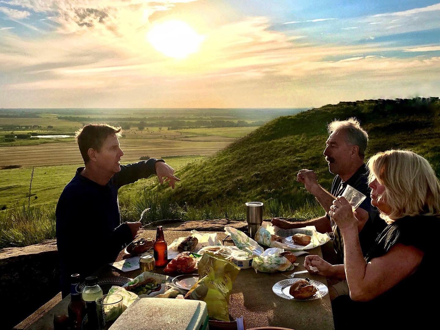 A sunset picnic on Coronado Heights.  The scenery is extraordinary, but people and food make it an experience.