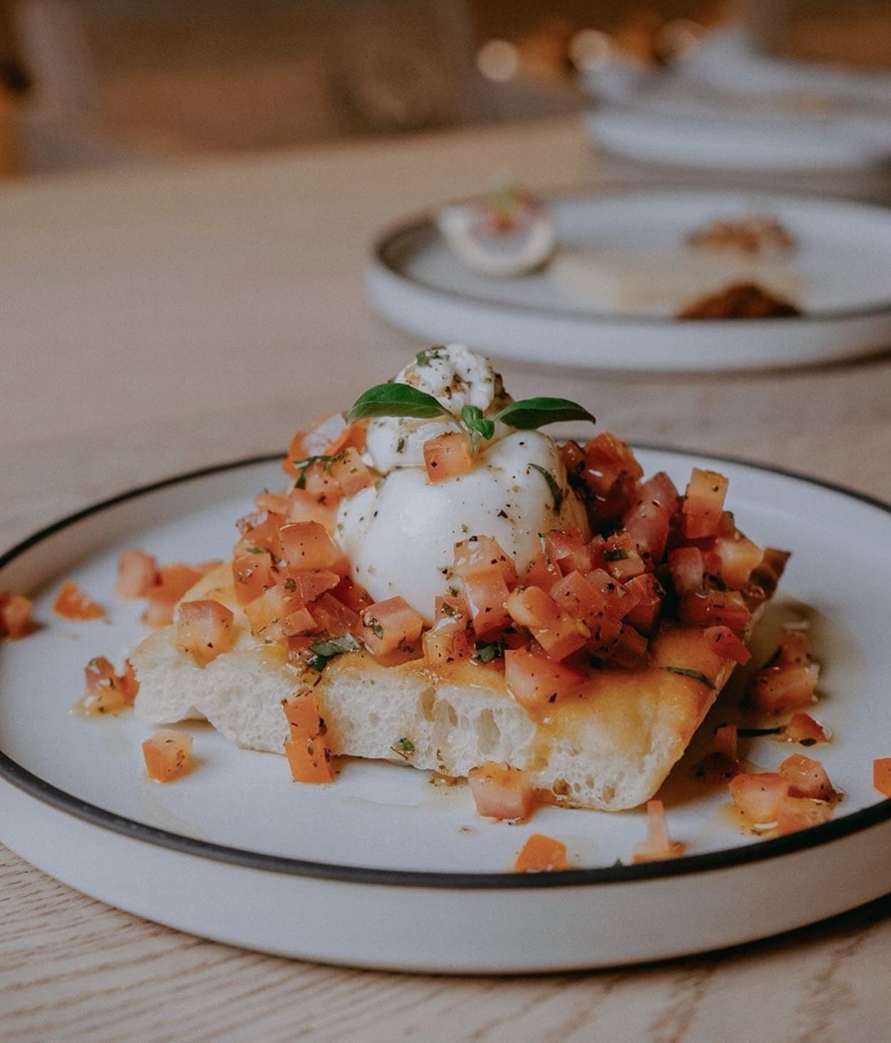 Burrata, house made focaccia, fresh tomato &amp; herbs.